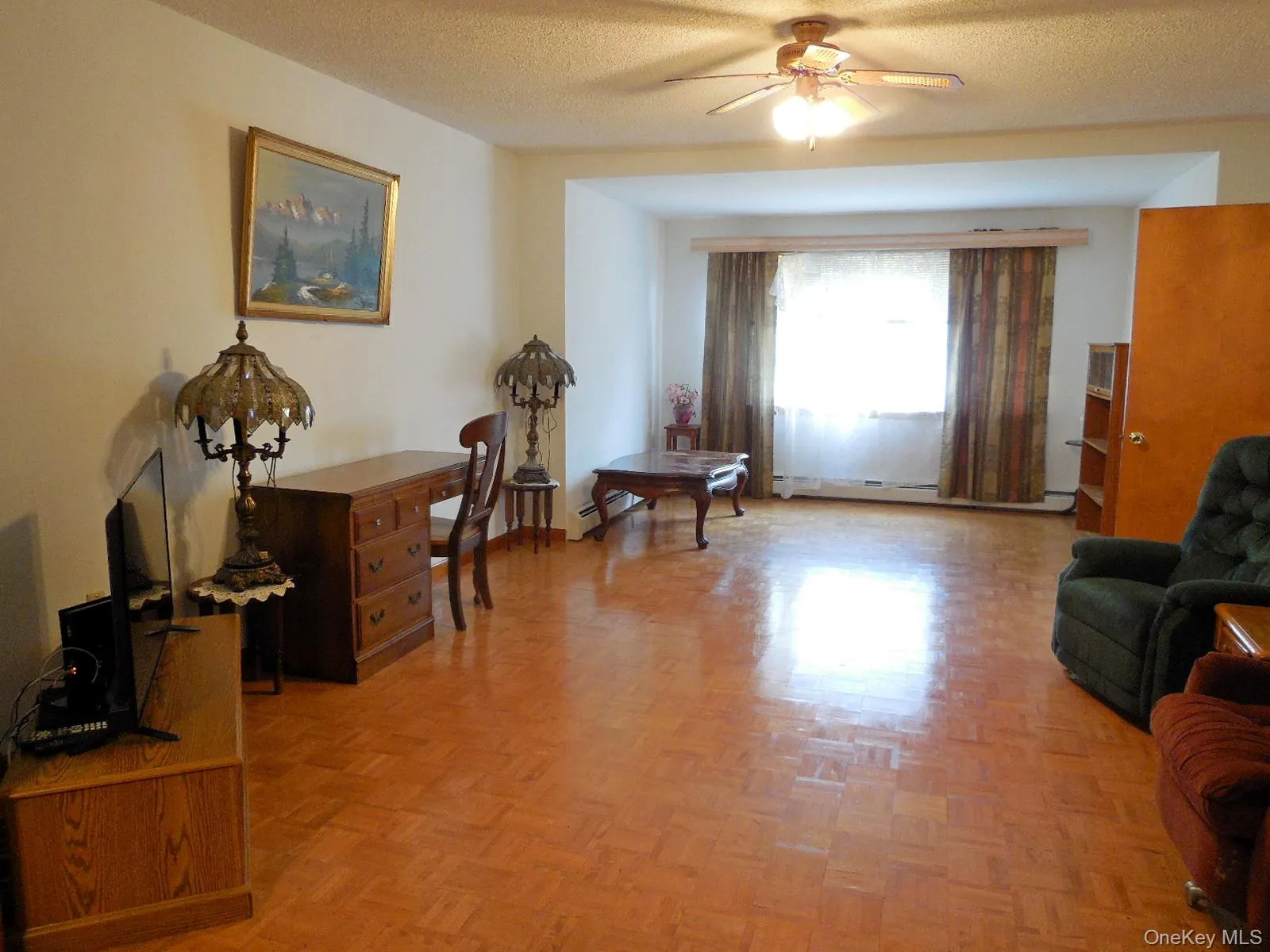 Living room off dining room, open floor plan. Living room off dining room, open floor plan.