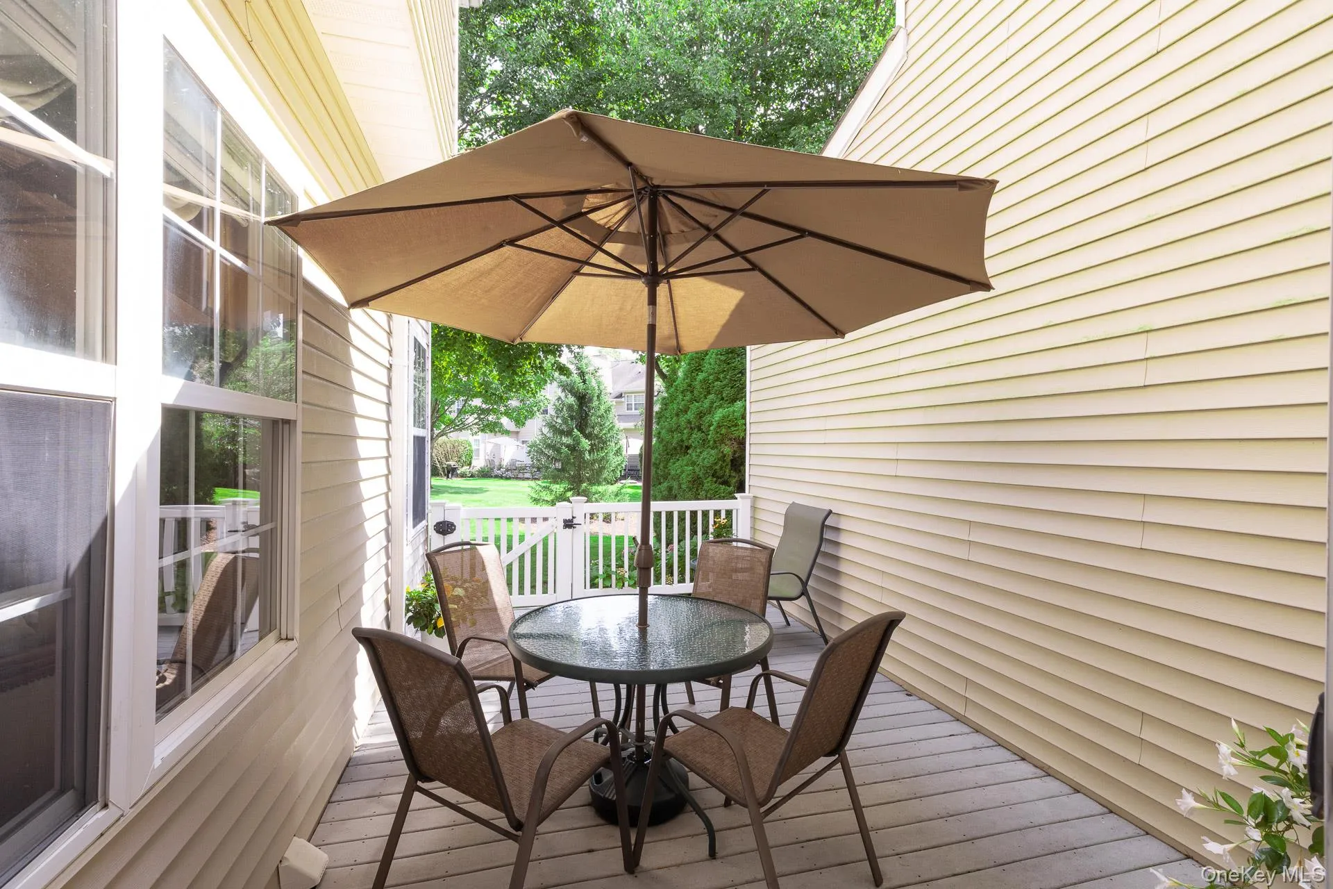 Stand alone patio overlooks lush green space Stand alone patio overlooks lush green space
