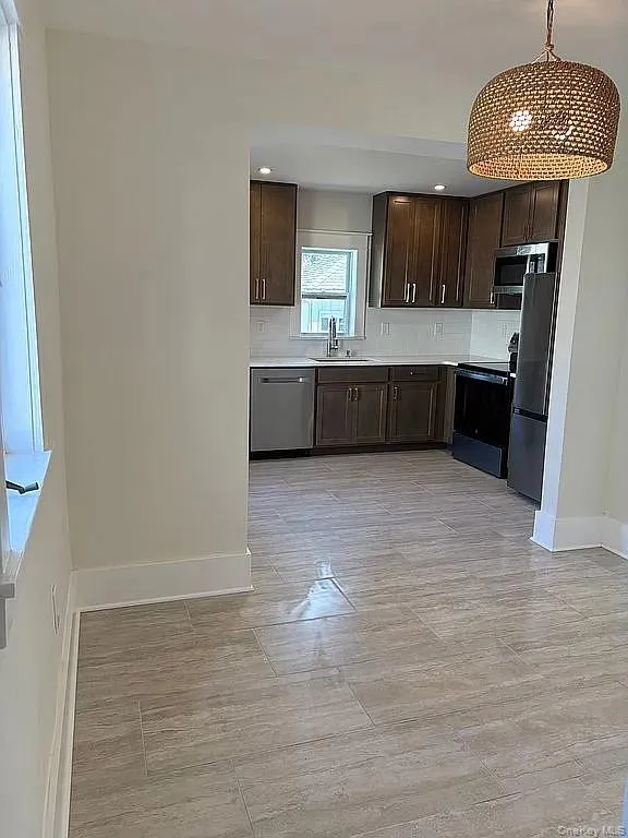 Kitchen and dining area Kitchen and dining area