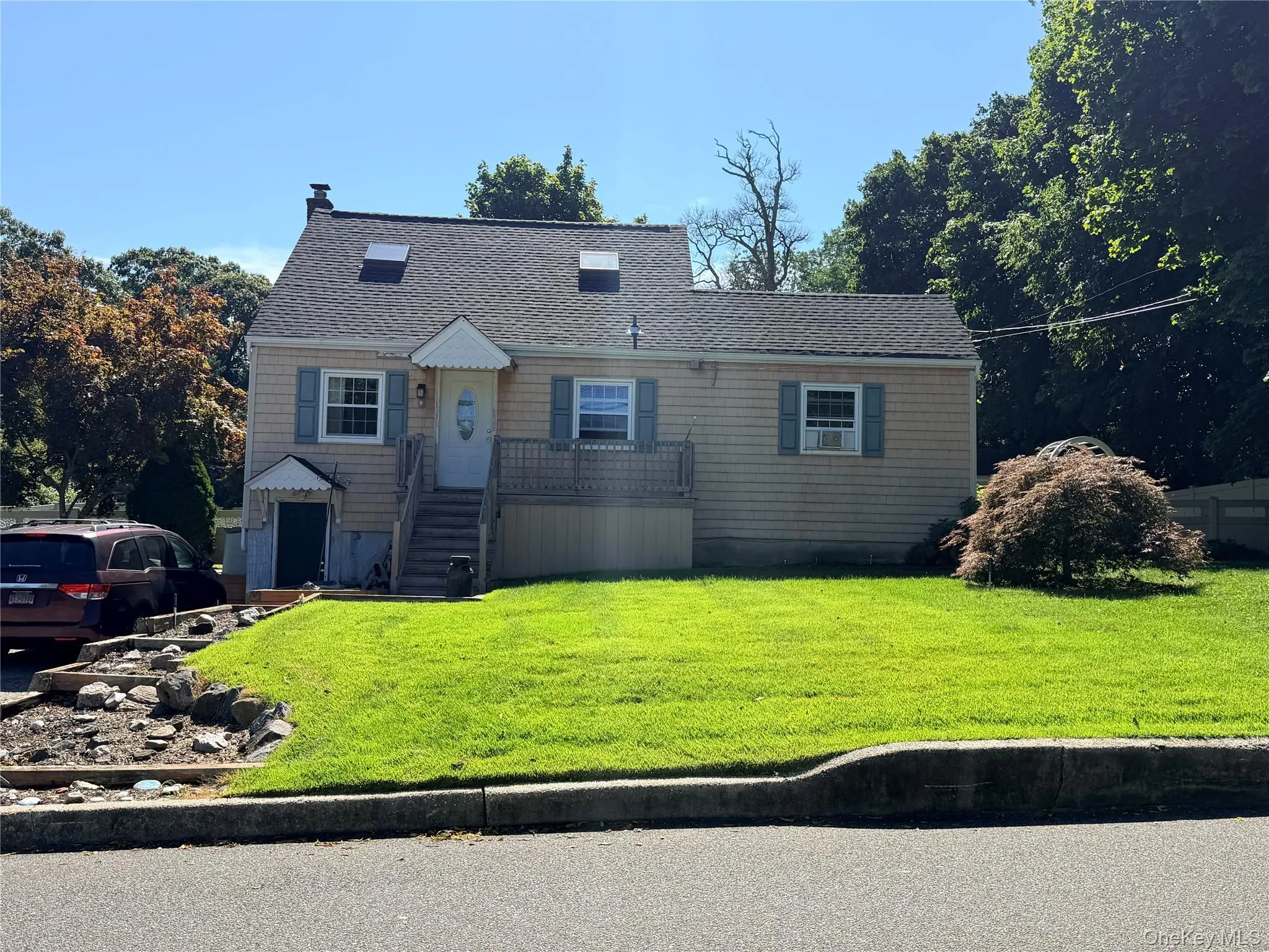 Cape Cod style house on corner lot Cape Cod style house on corner lot