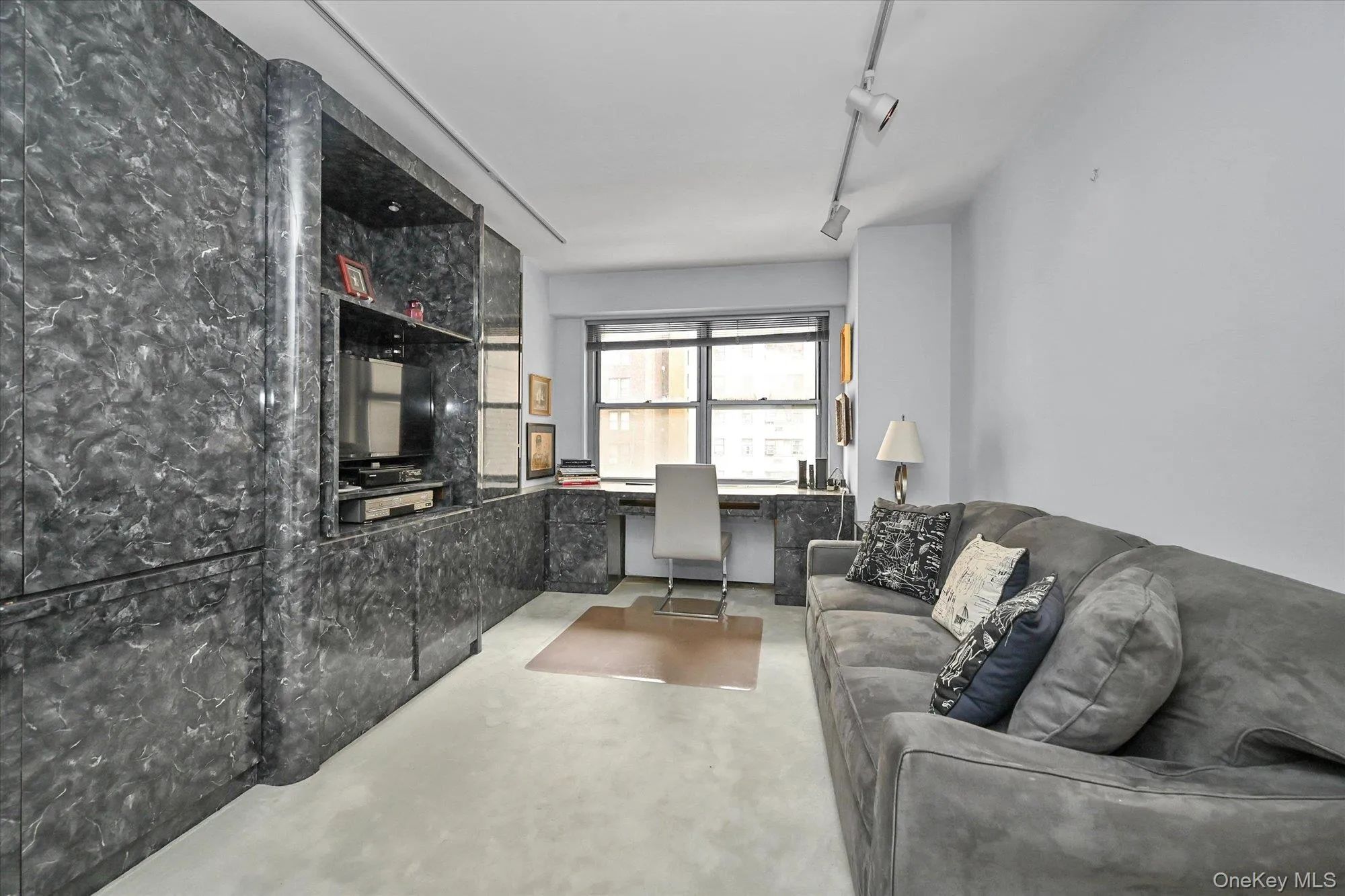 2nd bedroom has built-in cabinetry and a walk-in closet for plenty of storage. 2nd bedroom has built-in cabinetry and a walk-in closet for plenty of storage.