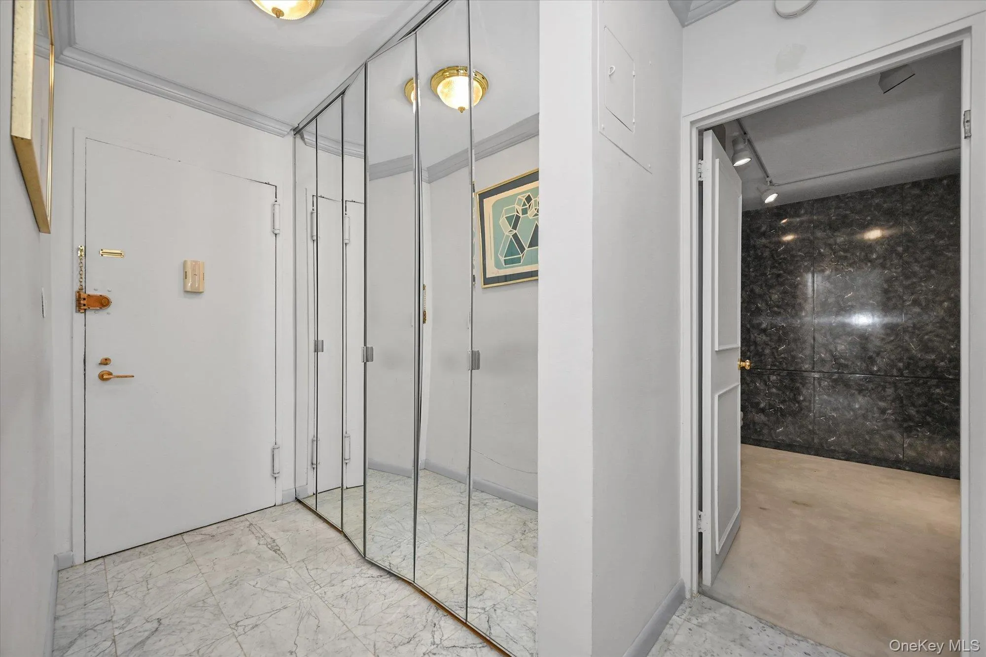 Entry with double closet for coats and storage Entry with double closet for coats and storage