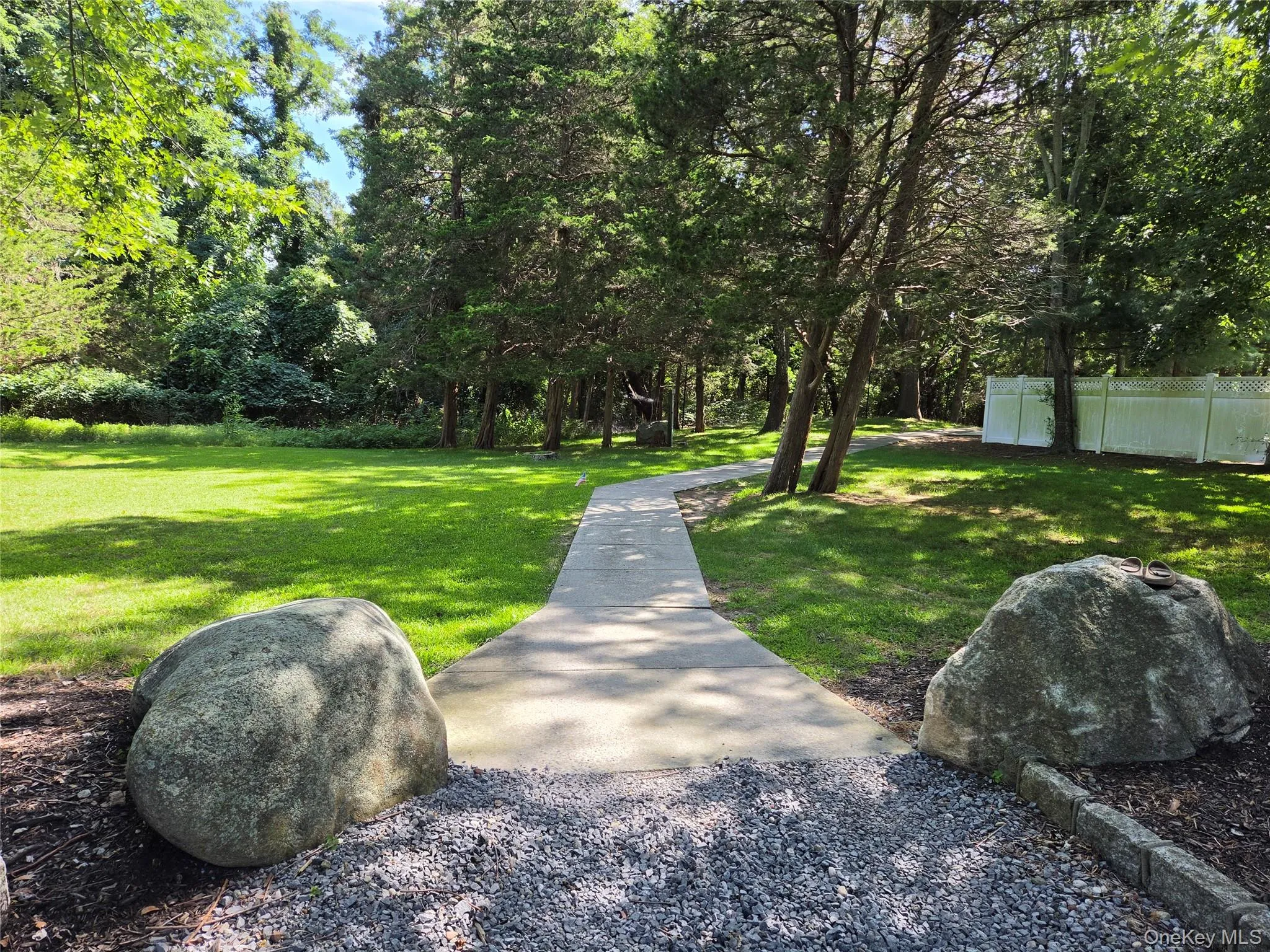 Magical paved walk-way to beach & dock from community parking lot for easy transport of beach & boat equipment. Magical paved walk-way to beach & dock from community parking lot for easy transport of beach & boat equipment.
