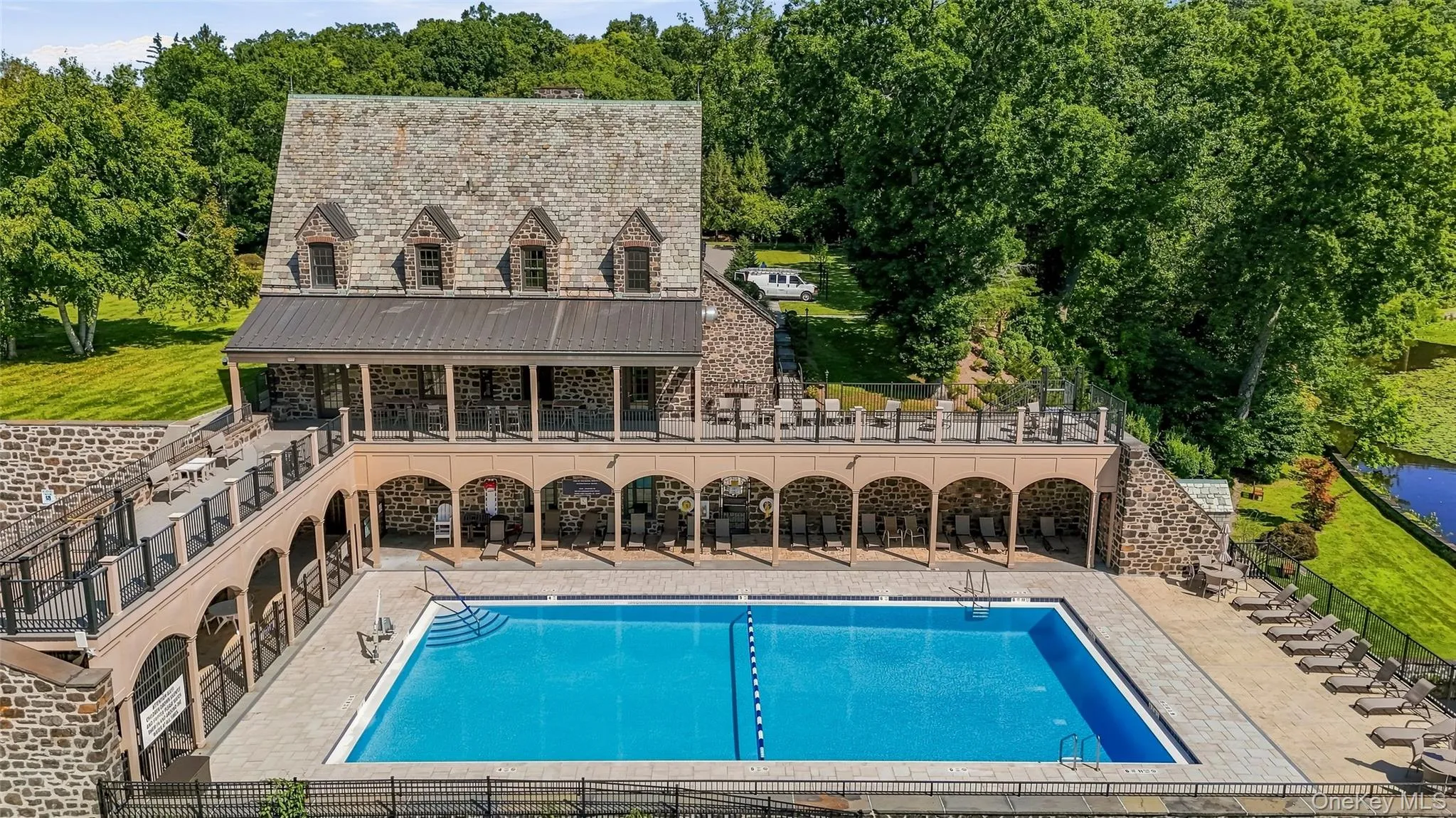 Large newly renovated community pool with amazing lake views Large newly renovated community pool with amazing lake views