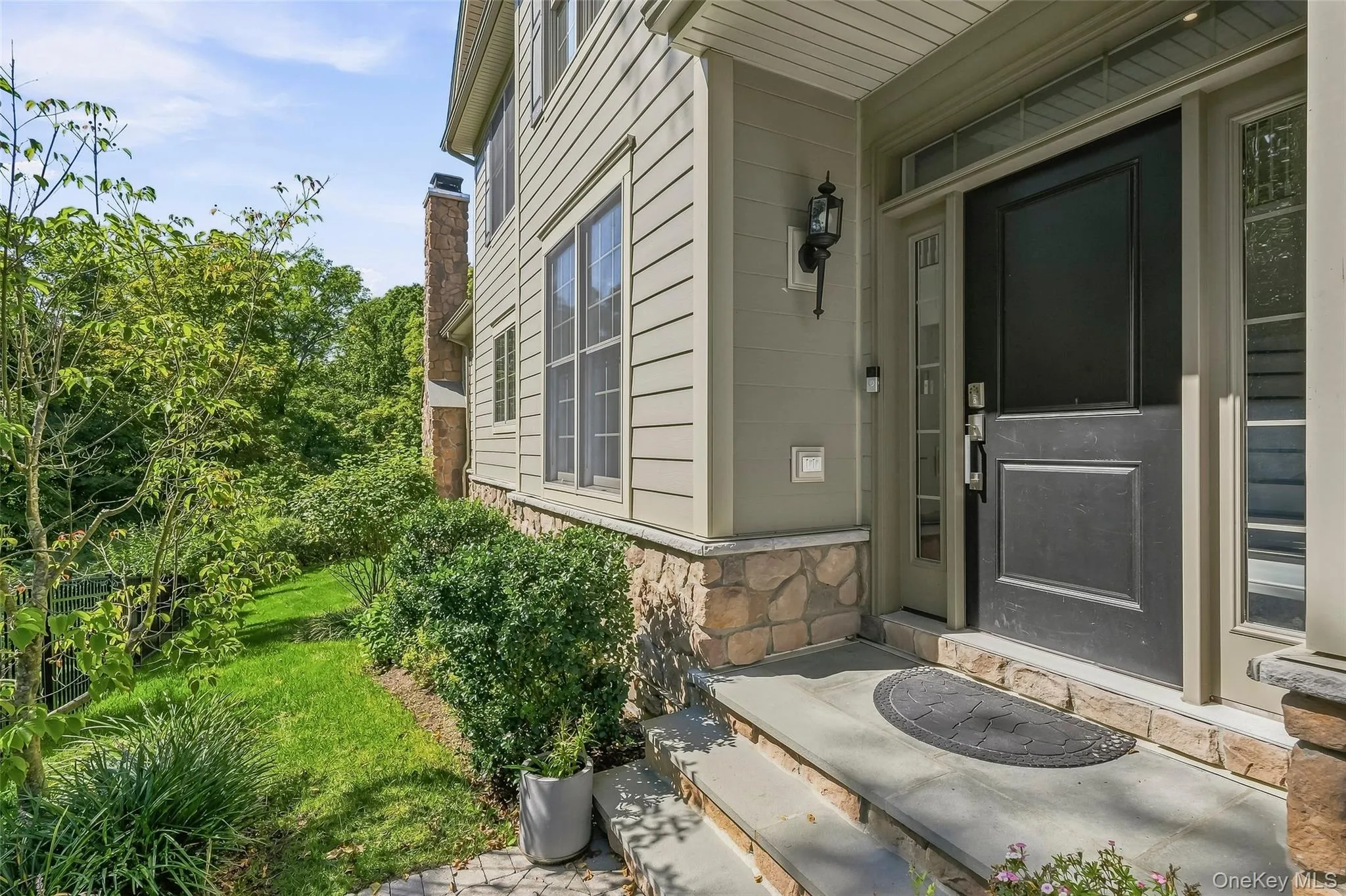 Private entrance on side of end unit Private entrance on side of end unit