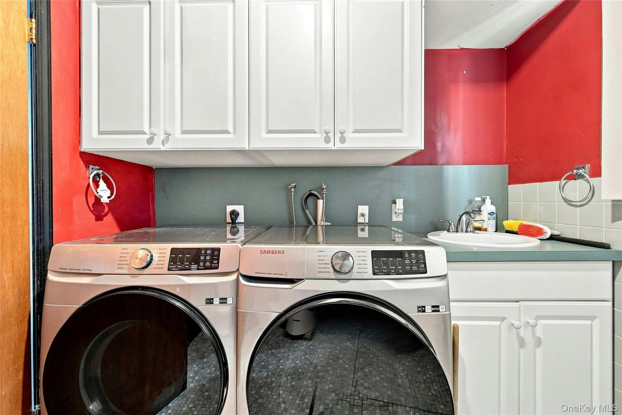Second Bathroom With A Three Year Old Stainless Steel Samsung Front Loading Washer & Dryer. Second Bathroom With A Three Year Old Stainless Steel Samsung Front Loading Washer & Dryer.