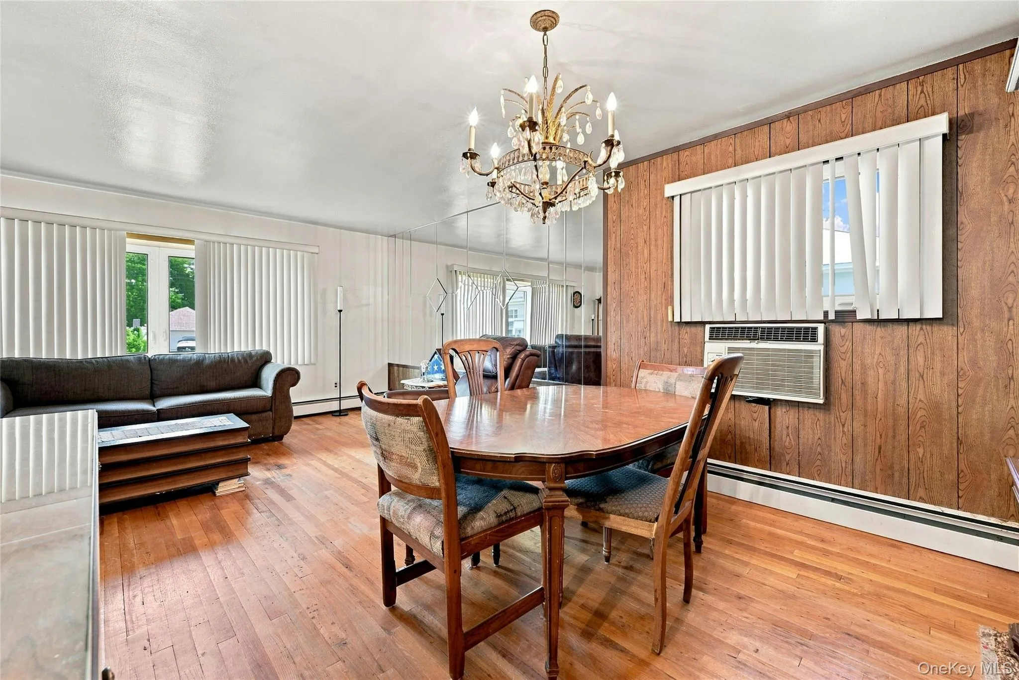 The Formal Living Room Opens Into The Formal Dining Room Offering Hardwood Floors, A Large Window For Natural Light, Ample Room For A Good Sized Dining Room Set/Furniture, And The Dining Room Opens Into The Eat In Kitchen. The Formal Living Room Opens Into The Formal Dining Room Offering Hardwood Floors, A Large Window For Natural Light, Ample Room For A Good Sized Dining Room Set/Furniture, And The Dining Room Opens Into The Eat In Kitchen.
