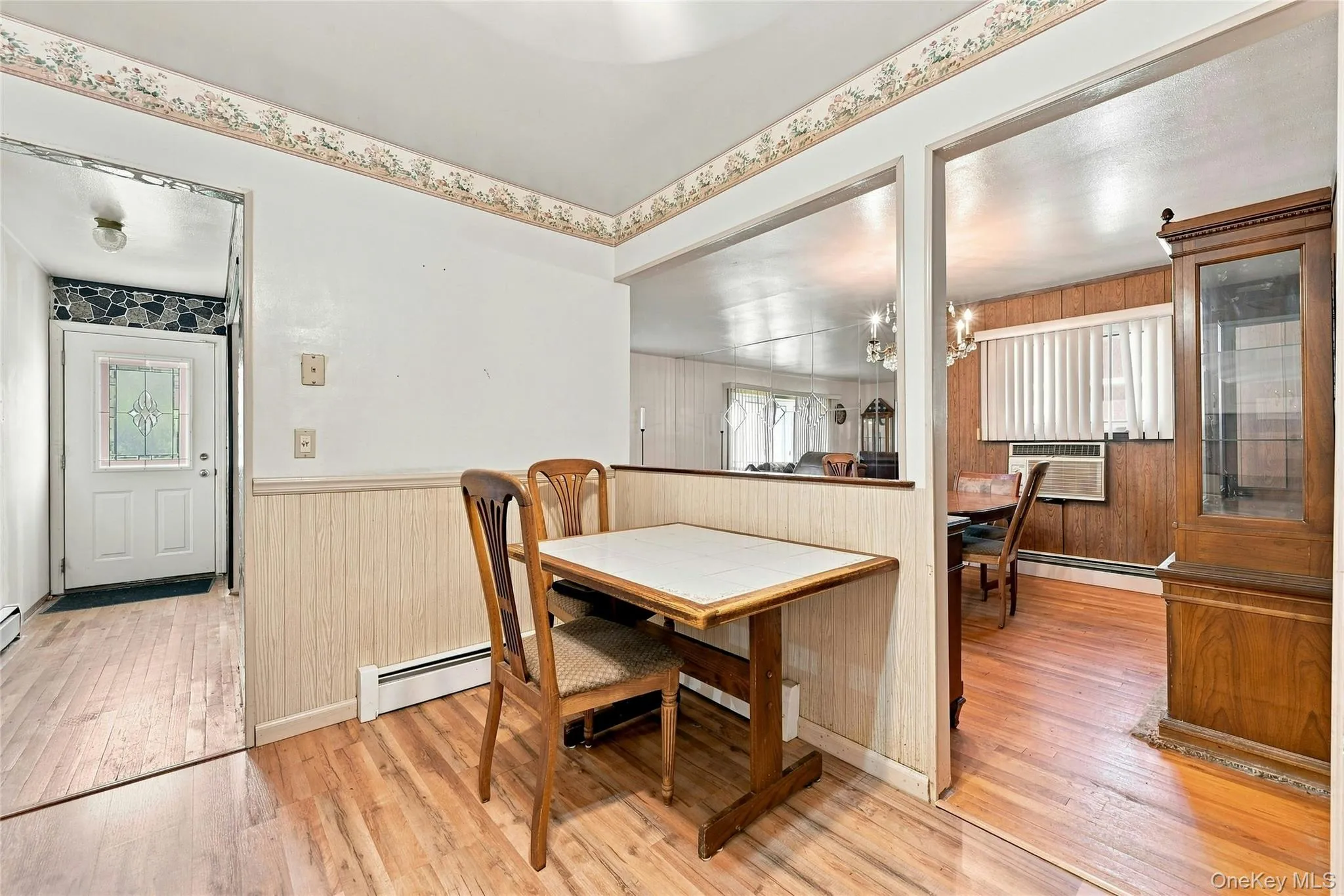 The Well Sized Dining Area In The Eat In Kitchen Which Opens Into The Formal Dining Room. The Well Sized Dining Area In The Eat In Kitchen Which Opens Into The Formal Dining Room.
