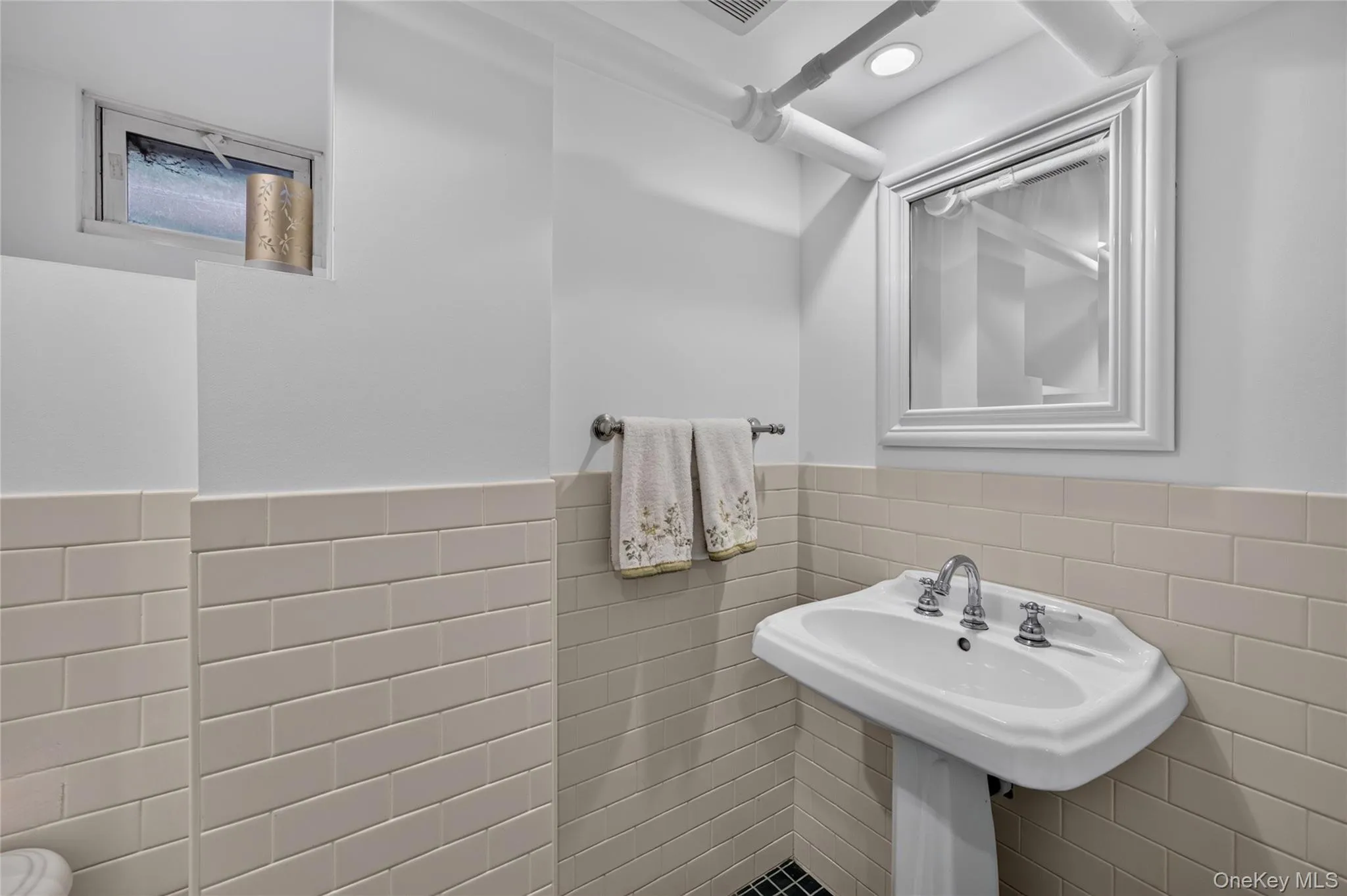 Powder Room Located in Basement Powder Room Located in Basement