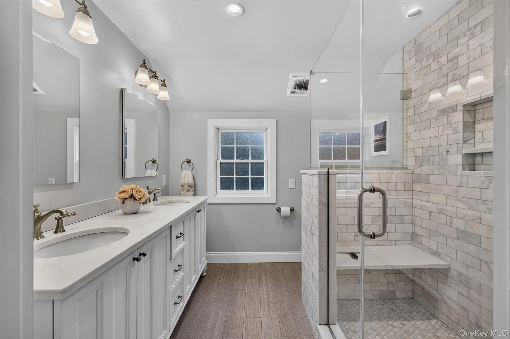 Updated bath with Carrara Marble Updated bath with Carrara Marble