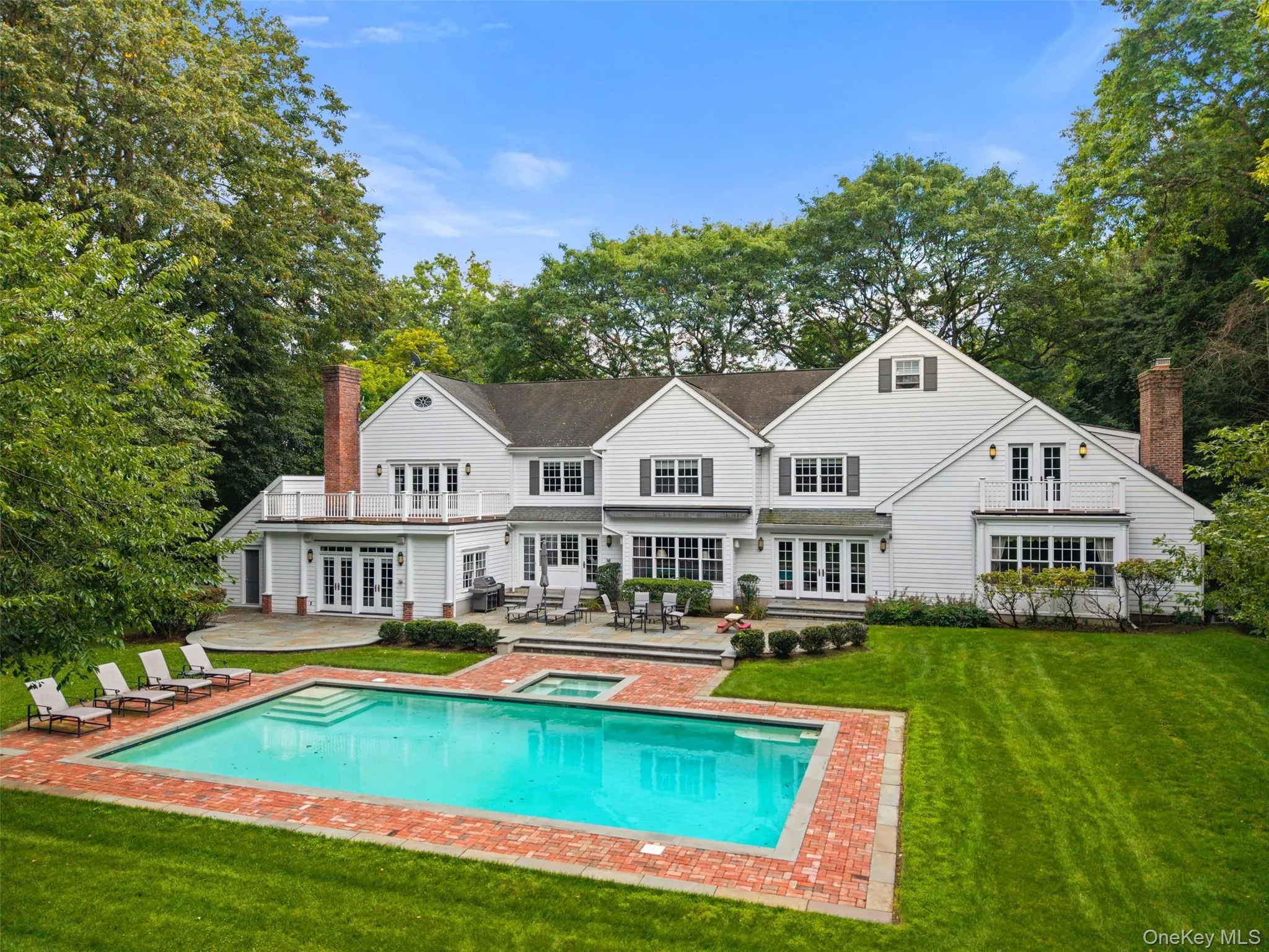 View of pool and patio with retractable awning View of pool and patio with retractable awning