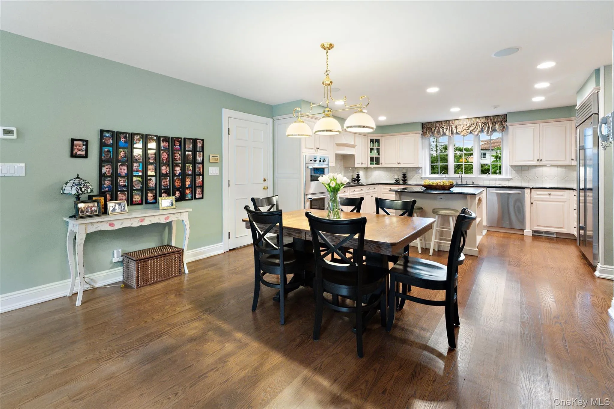 View of kitchen from breakfast area with convenient access to garage View of kitchen from breakfast area with convenient access to garage