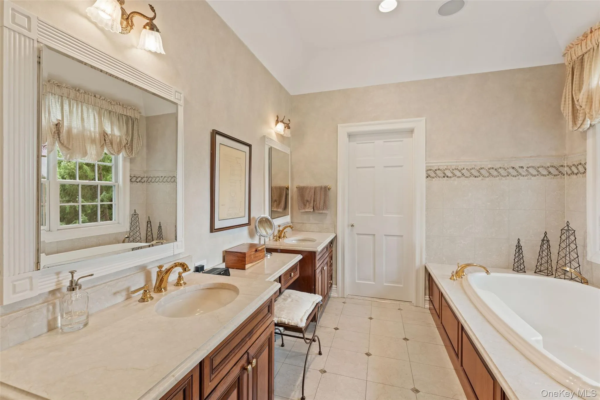 Primary Bathroom with double vanities and soaking tub Primary Bathroom with double vanities and soaking tub