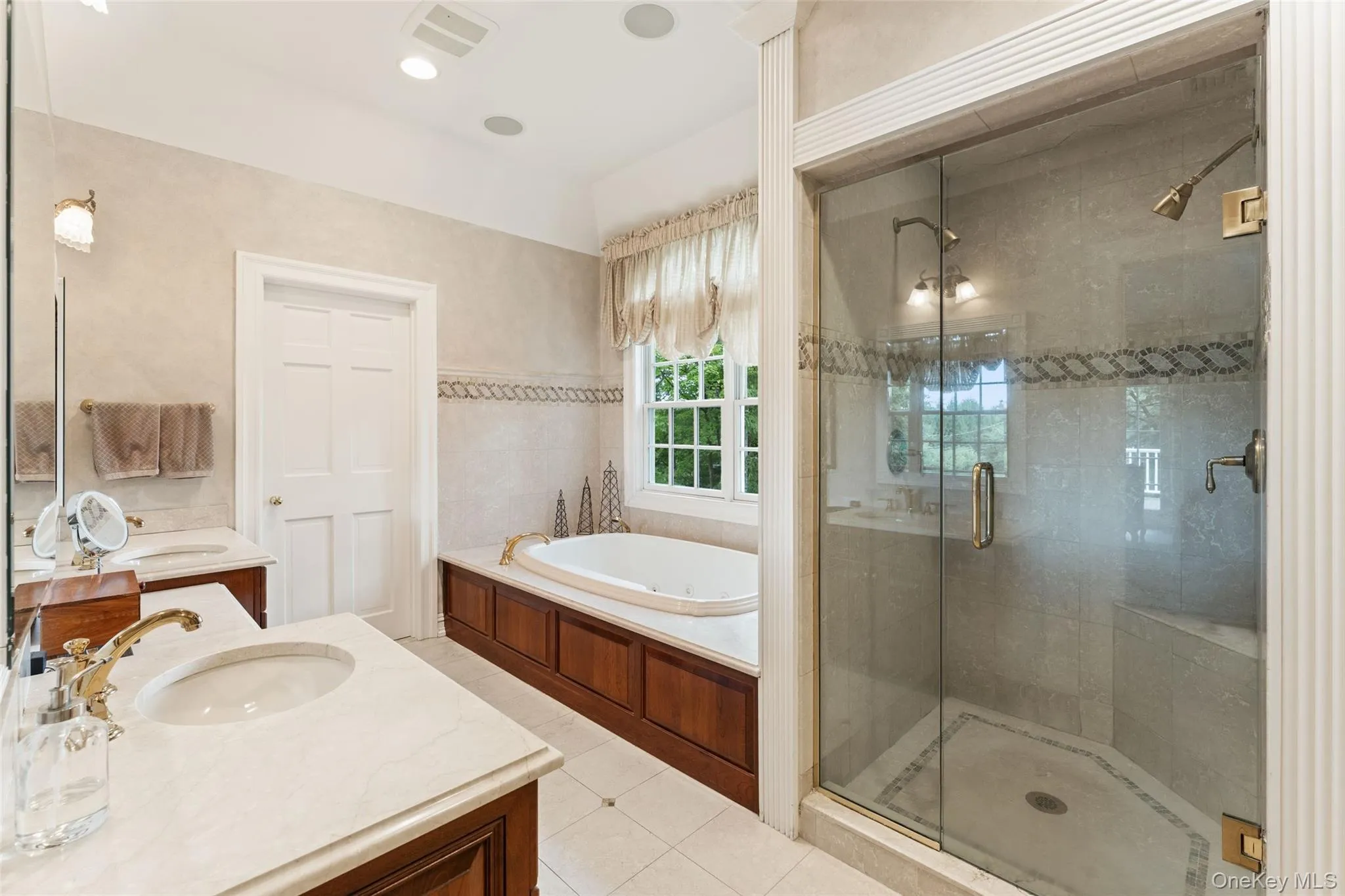 View of primary bath with stall shower and seperate water closet View of primary bath with stall shower and seperate water closet