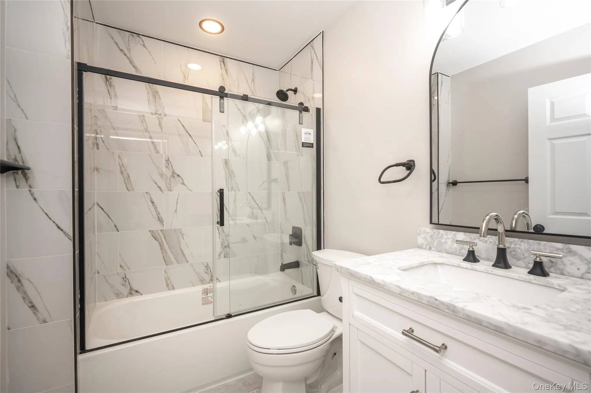 This hall bathroom is located on the second floor just outside of bedrooms 2 and 3. This hall bathroom is located on the second floor just outside of bedrooms 2 and 3.