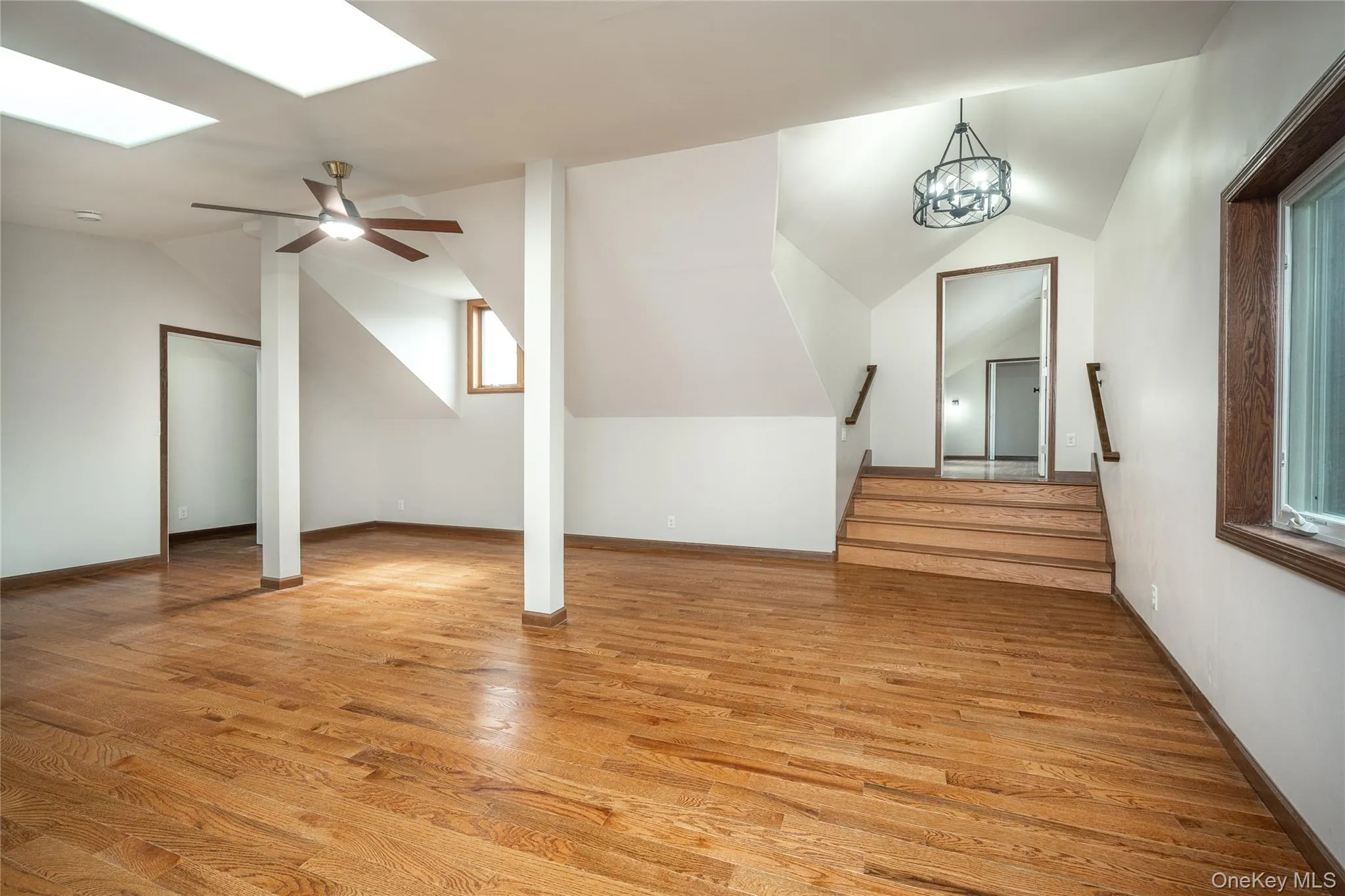 This second bonus room can be entered from both the first floor and the second floor. You can see the stairway to an adjoining bedroom in the background This second bonus room can be entered from both the first floor and the second floor. You can see the stairway to an adjoining bedroom in the background