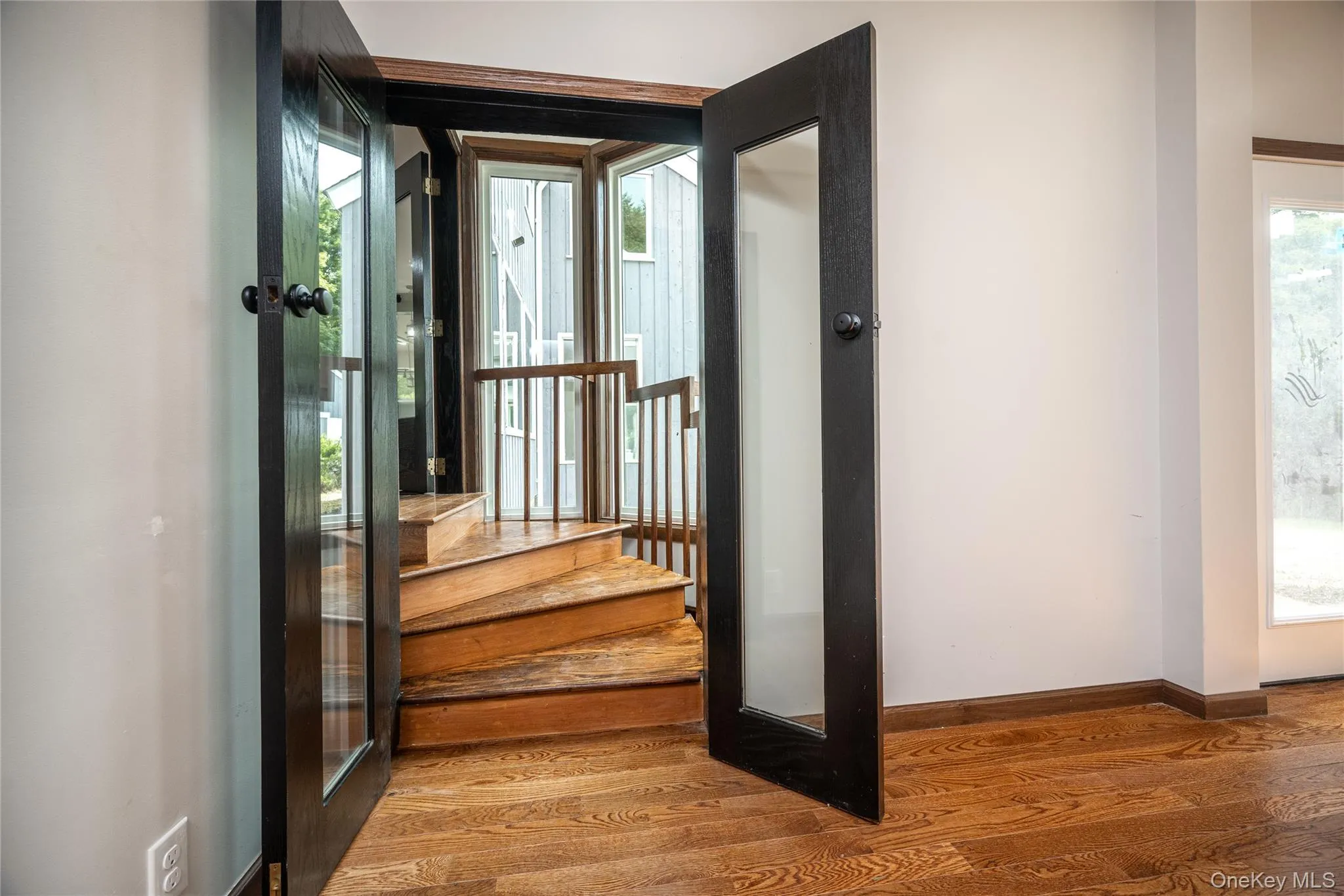 Enter from the dining room a few steps down to the spacious gameroom. Enter from the dining room a few steps down to the spacious gameroom.