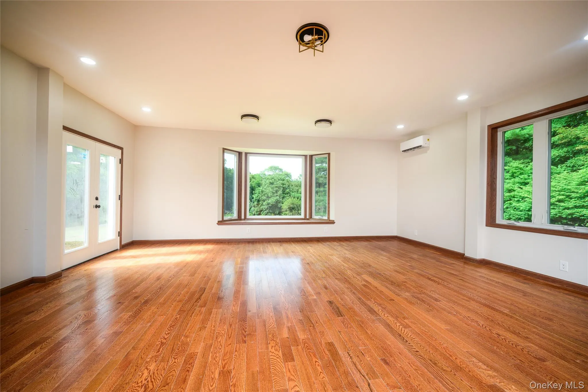 A versatile space that can easily accommodate a billiard table and Game room photo 1 video games. It has an entry to to the outdoors on the left. A versatile space that can easily accommodate a billiard table and Game room photo 1 video games. It has an entry to to the outdoors on the left.