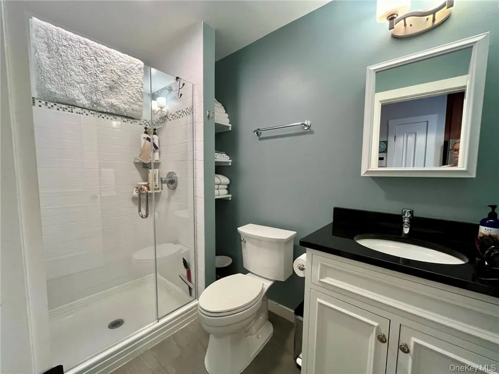 Full bathroom with tiled walk in shower Full bathroom with tiled walk in shower