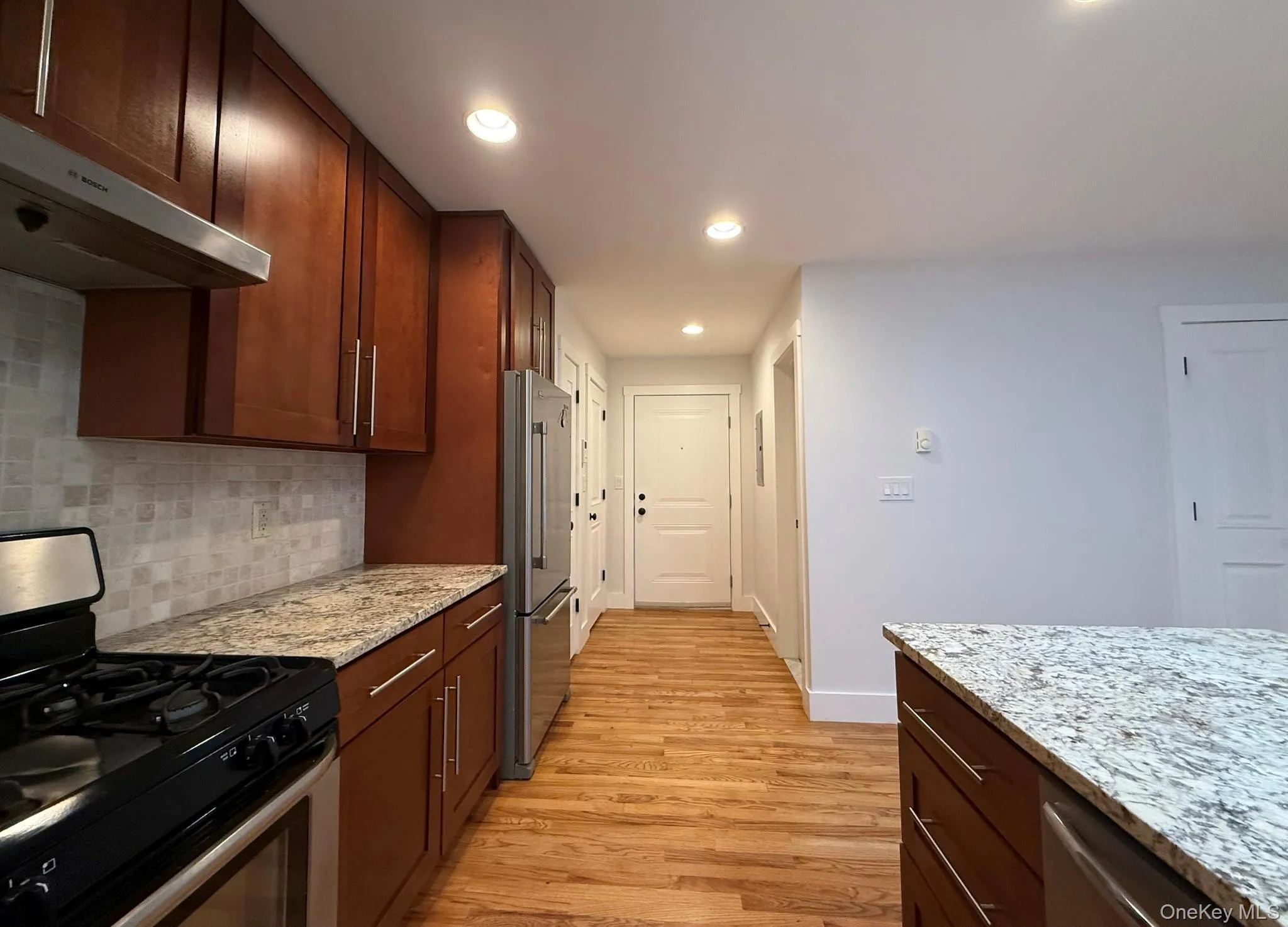 Granite counters, stainless steel appliances, including a dishwasher, and plenty of cabinets Granite counters, stainless steel appliances, including a dishwasher, and plenty of cabinets