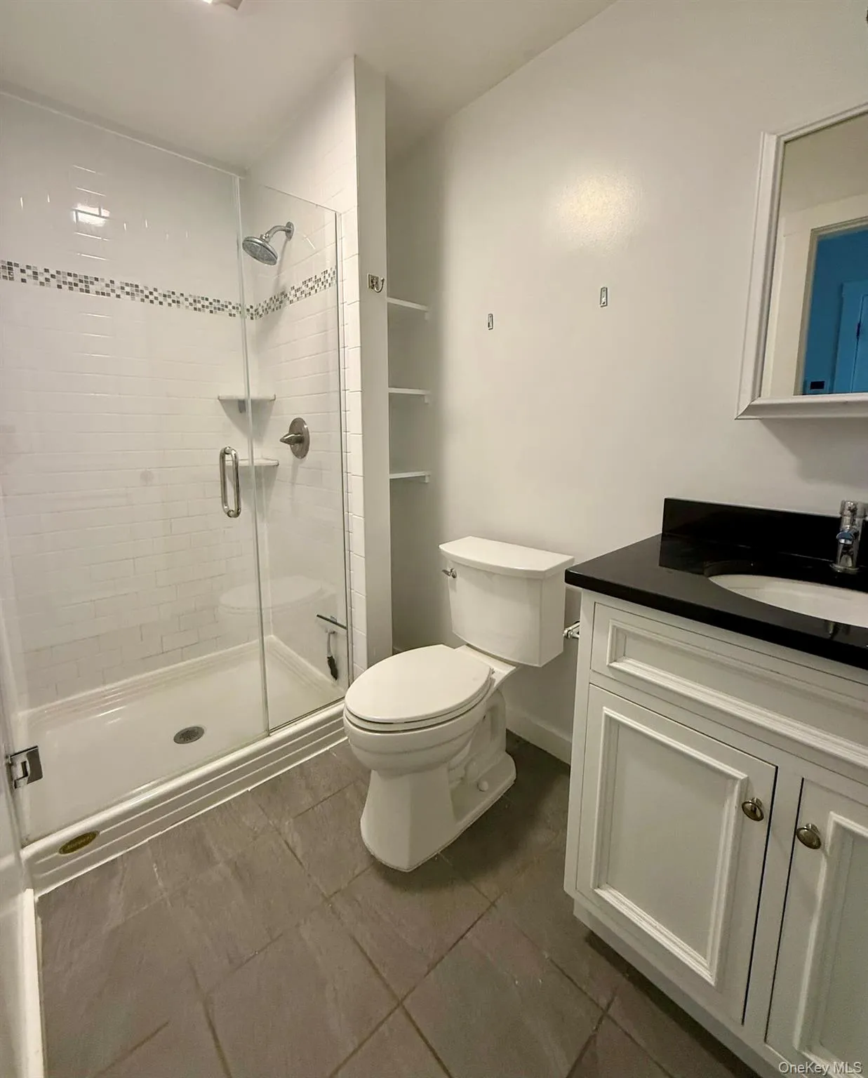 Full bathroom with walk-in shower Full bathroom with walk-in shower