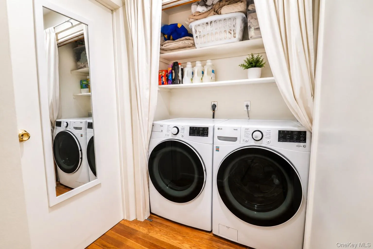 A convenient and functional laundry area features a washer and dryer, making everyday chores simple and efficient. A convenient and functional laundry area features a washer and dryer, making everyday chores simple and efficient.
