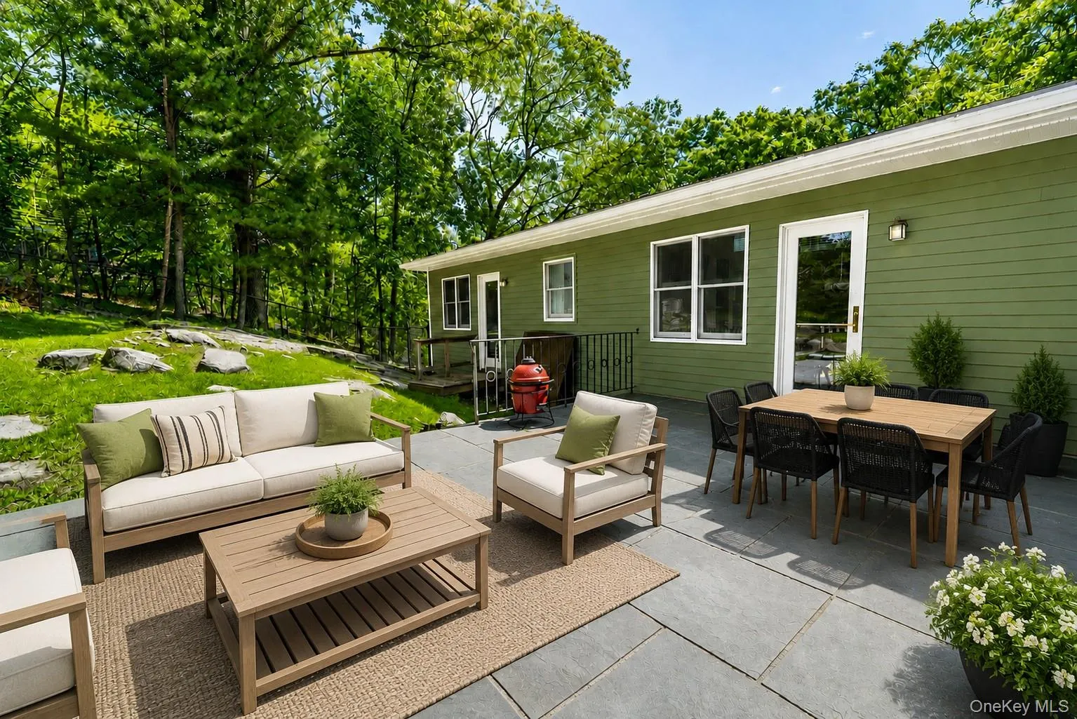This digitally staged patio gives you a glimpse of what your backyard could look like—with the perfect setup for relaxing, entertaining, and enjoying the outdoors. This digitally staged patio gives you a glimpse of what your backyard could look like—with the perfect setup for relaxing, entertaining, and enjoying the outdoors.