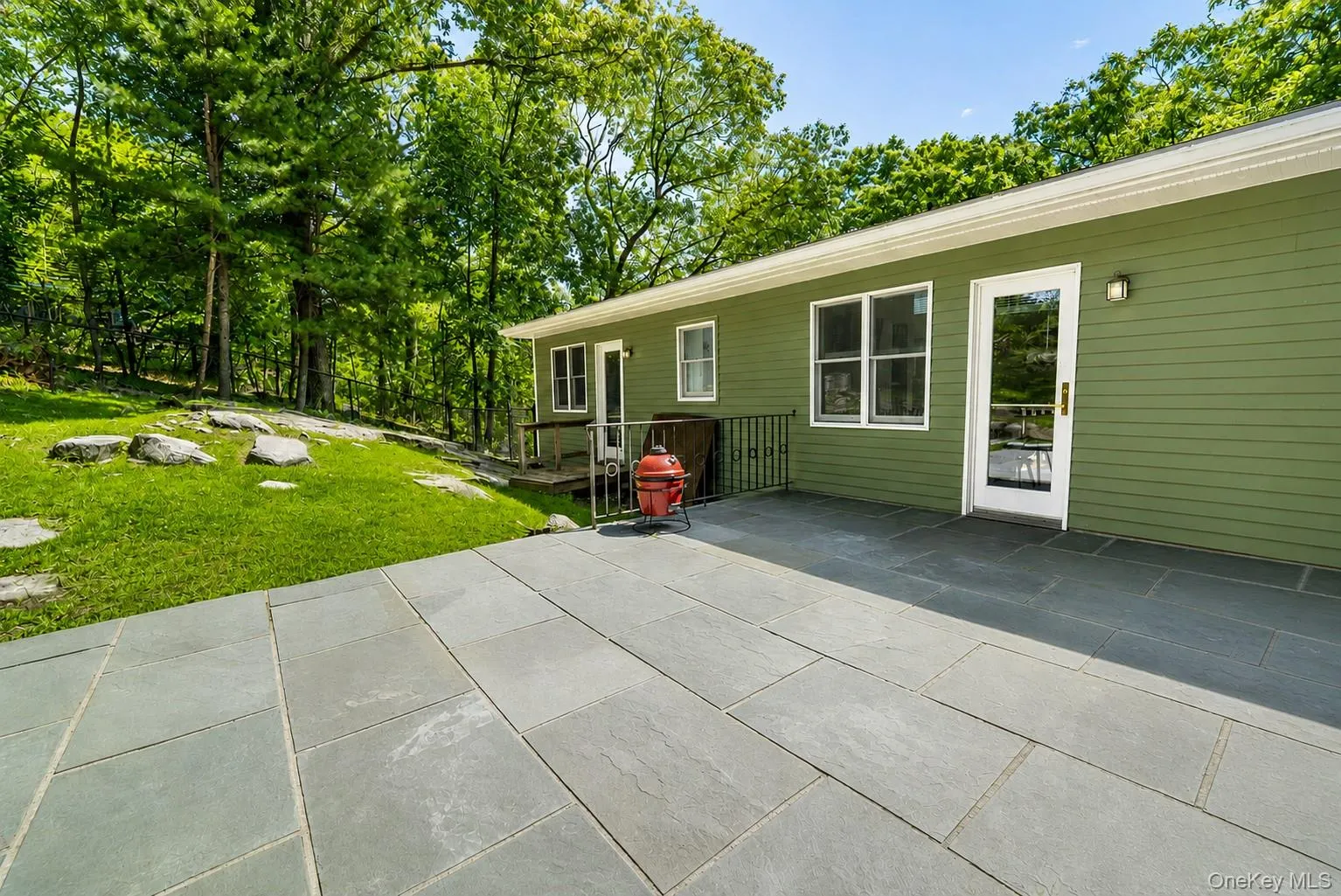 Backyard patio with easy access to dining room and kitchen. Backyard patio with easy access to dining room and kitchen.