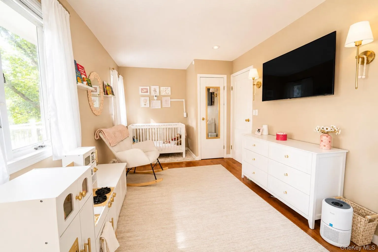 The spacious secondary bedroom features an abundance of windows that fill the room with natural light, creating a bright, airy, and welcoming space. The spacious secondary bedroom features an abundance of windows that fill the room with natural light, creating a bright, airy, and welcoming space.