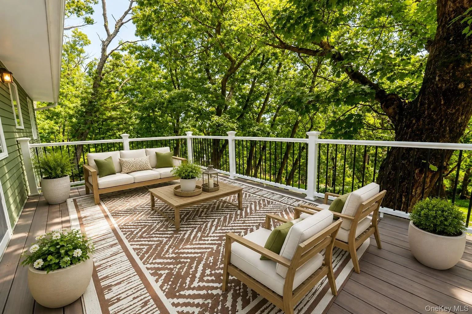 The beautifully digitally staged updated composite deck, conveniently located just off the living room, is the perfect spot to relax, unwind, and enjoy the fresh air while taking in the peaceful outdoor setting. The beautifully digitally staged updated composite deck, conveniently located just off the living room, is the perfect spot to relax, unwind, and enjoy the fresh air while taking in the peaceful outdoor setting.
