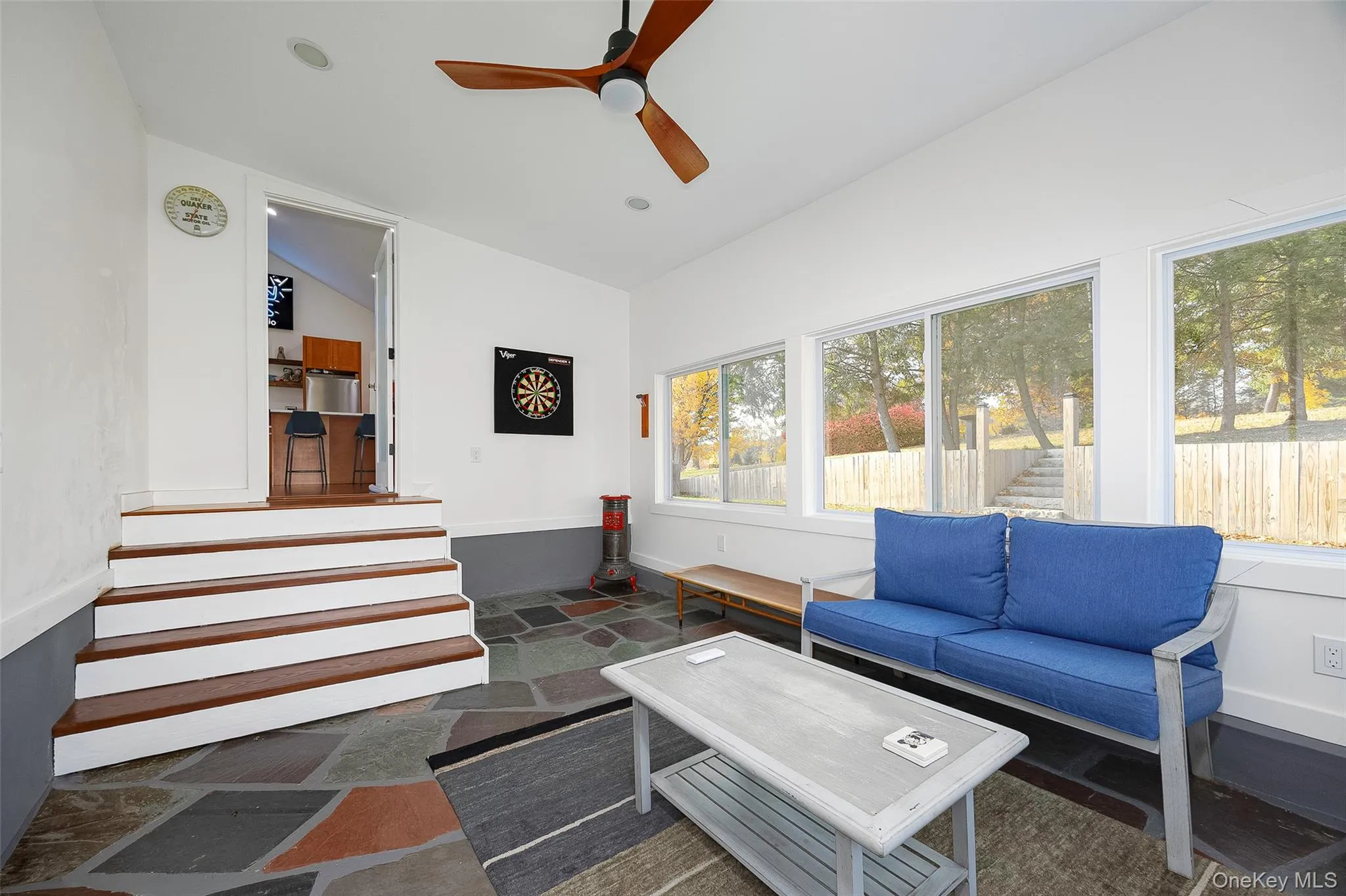 Sunroom / solarium featuring lofted ceiling Sunroom / solarium featuring lofted ceiling