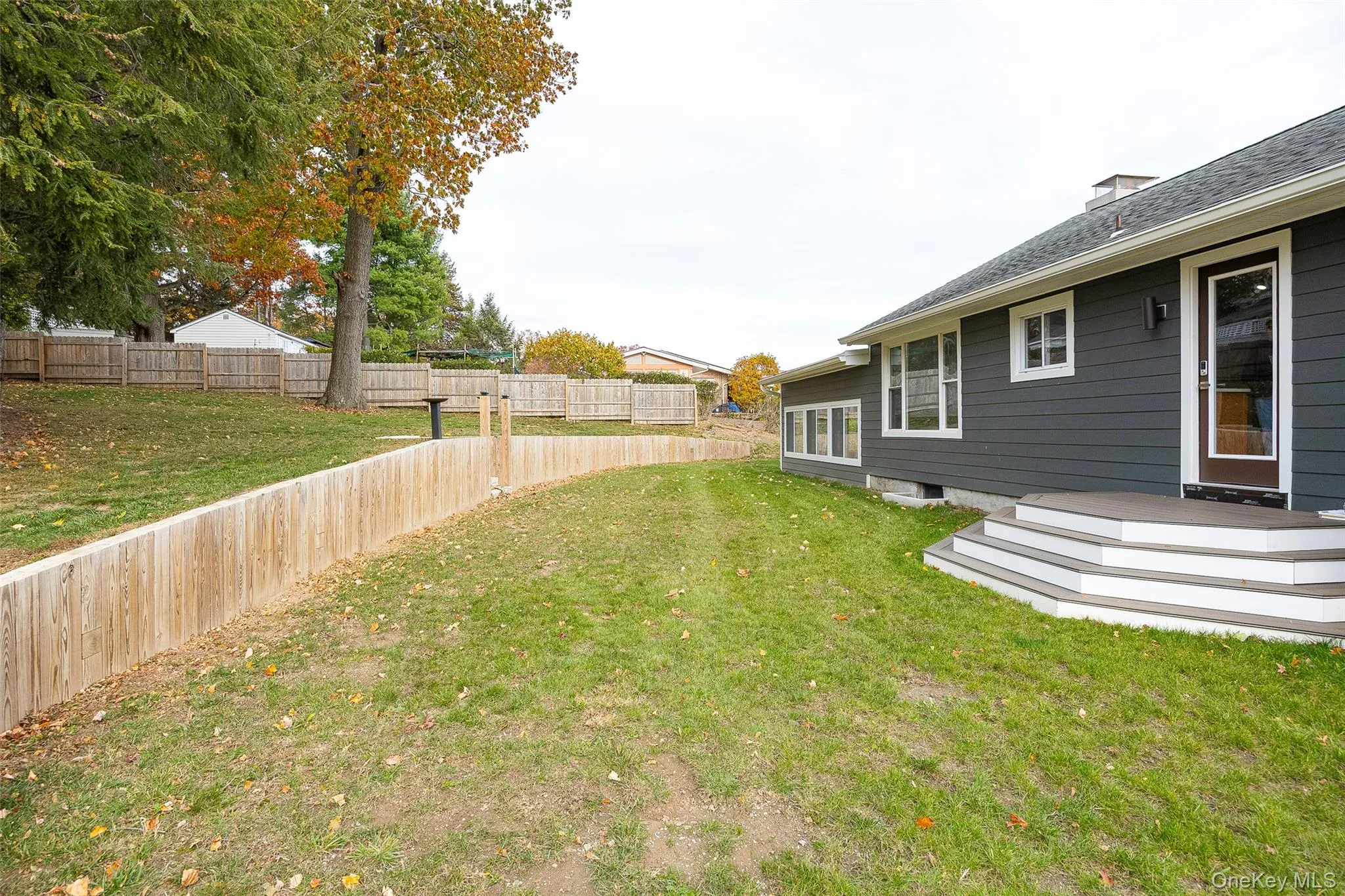 View of yard with a deck View of yard with a deck