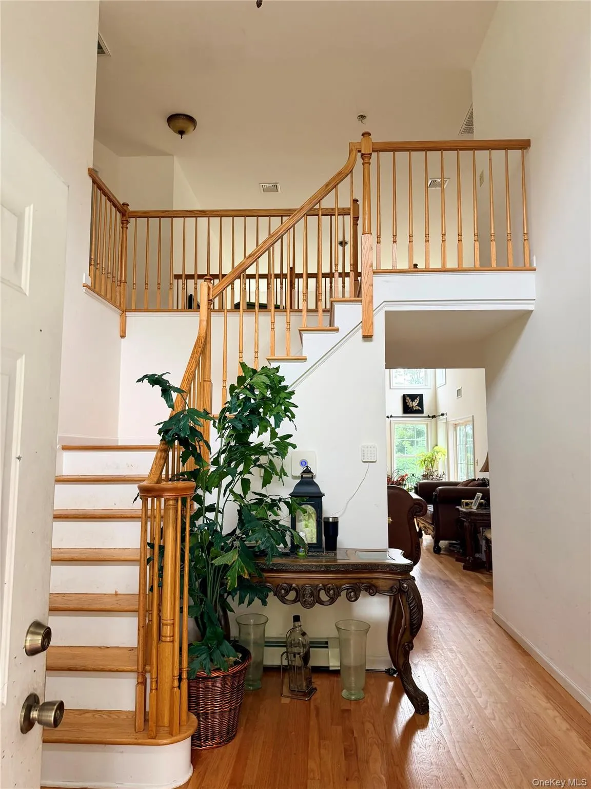 View of entry foyer featuring galley catwalk on second floor. View of entry foyer featuring galley catwalk on second floor.