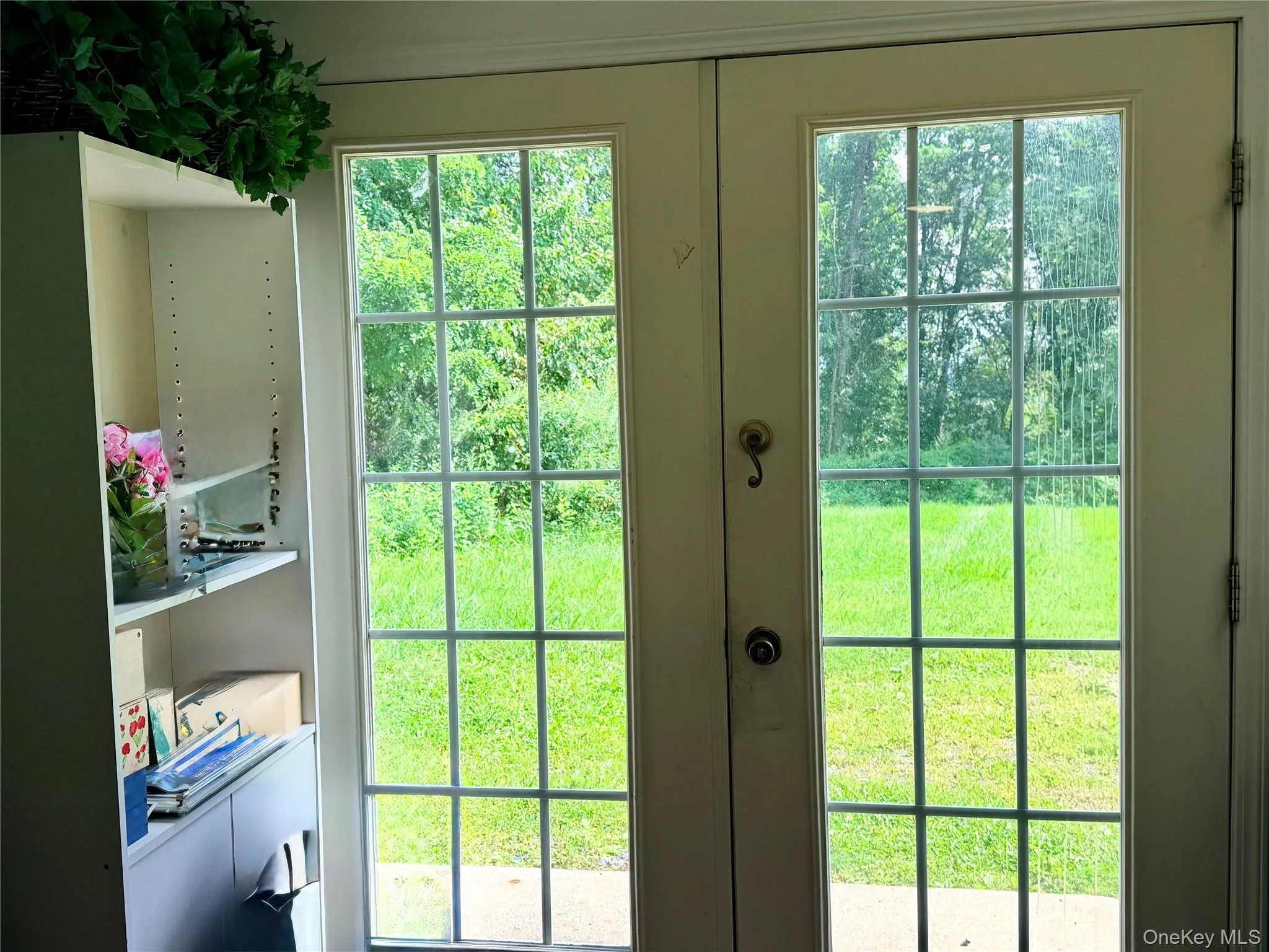French door entry into in-law suite. This area also has access from inside the home. French door entry into in-law suite. This area also has access from inside the home.