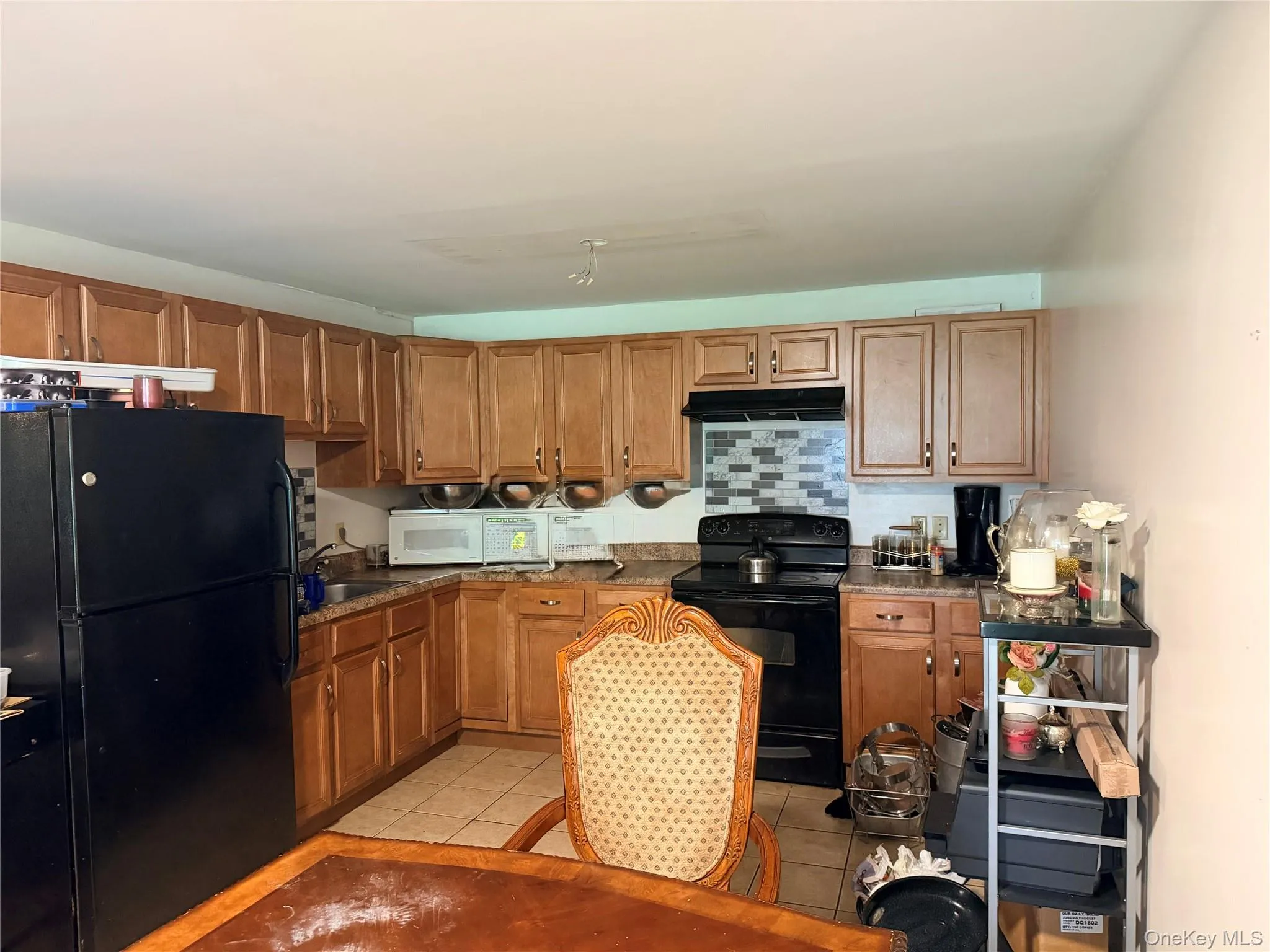 Kitchen with dining area. Kitchen with dining area.