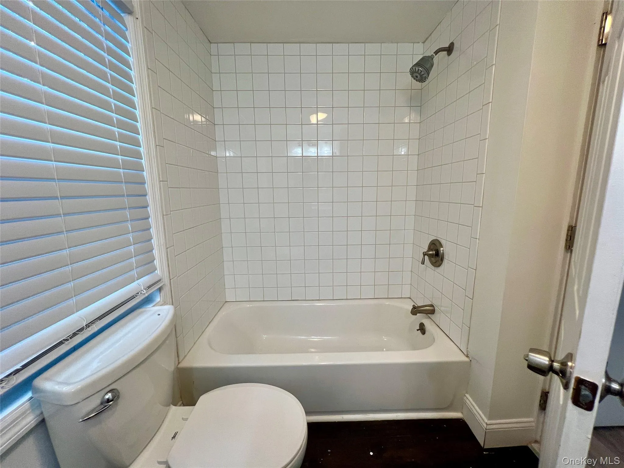 Full bath with toilet and bathing tub / shower combination Full bath with toilet and bathing tub / shower combination