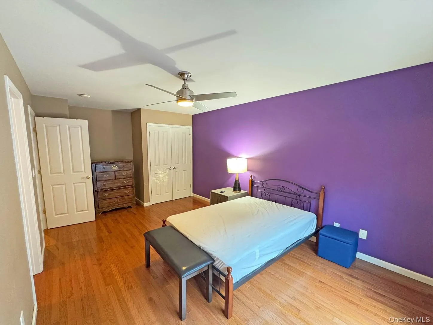 Hardwood flooring, ceiling fan with integrated lighting, bi-fold closet doors, and solid interior doors Hardwood flooring, ceiling fan with integrated lighting, bi-fold closet doors, and solid interior doors