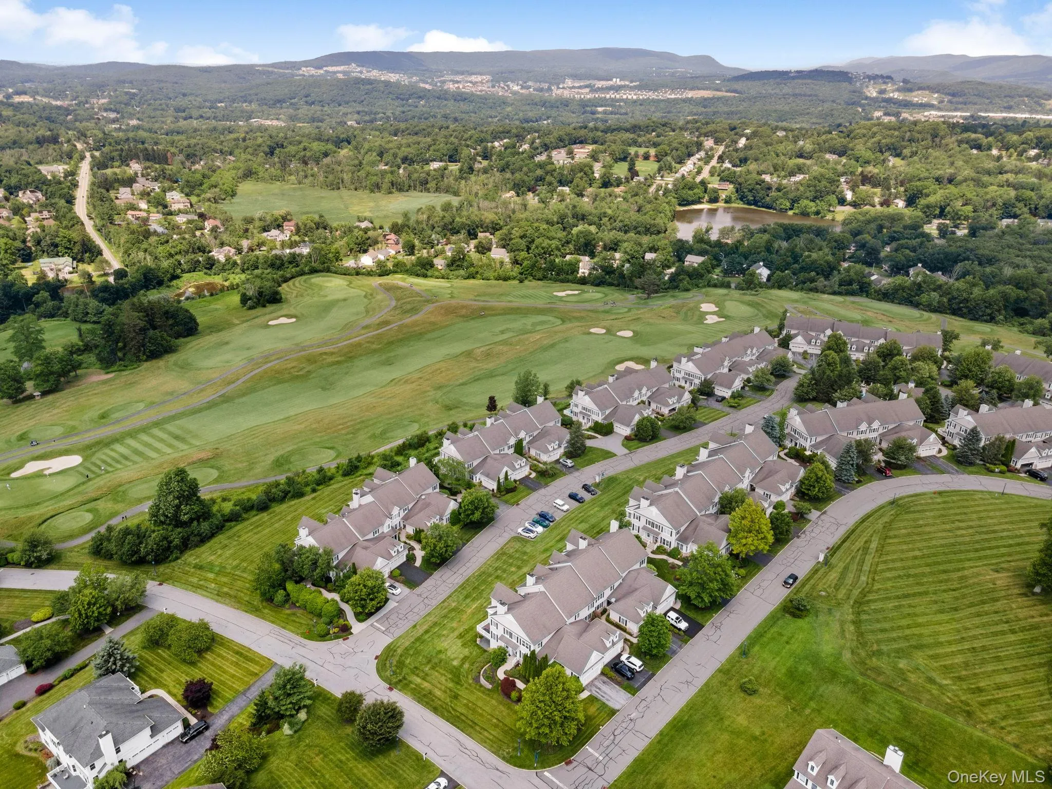 Aerial view of residential area with a mountain backdrop Aerial view of residential area with a mountain backdrop
