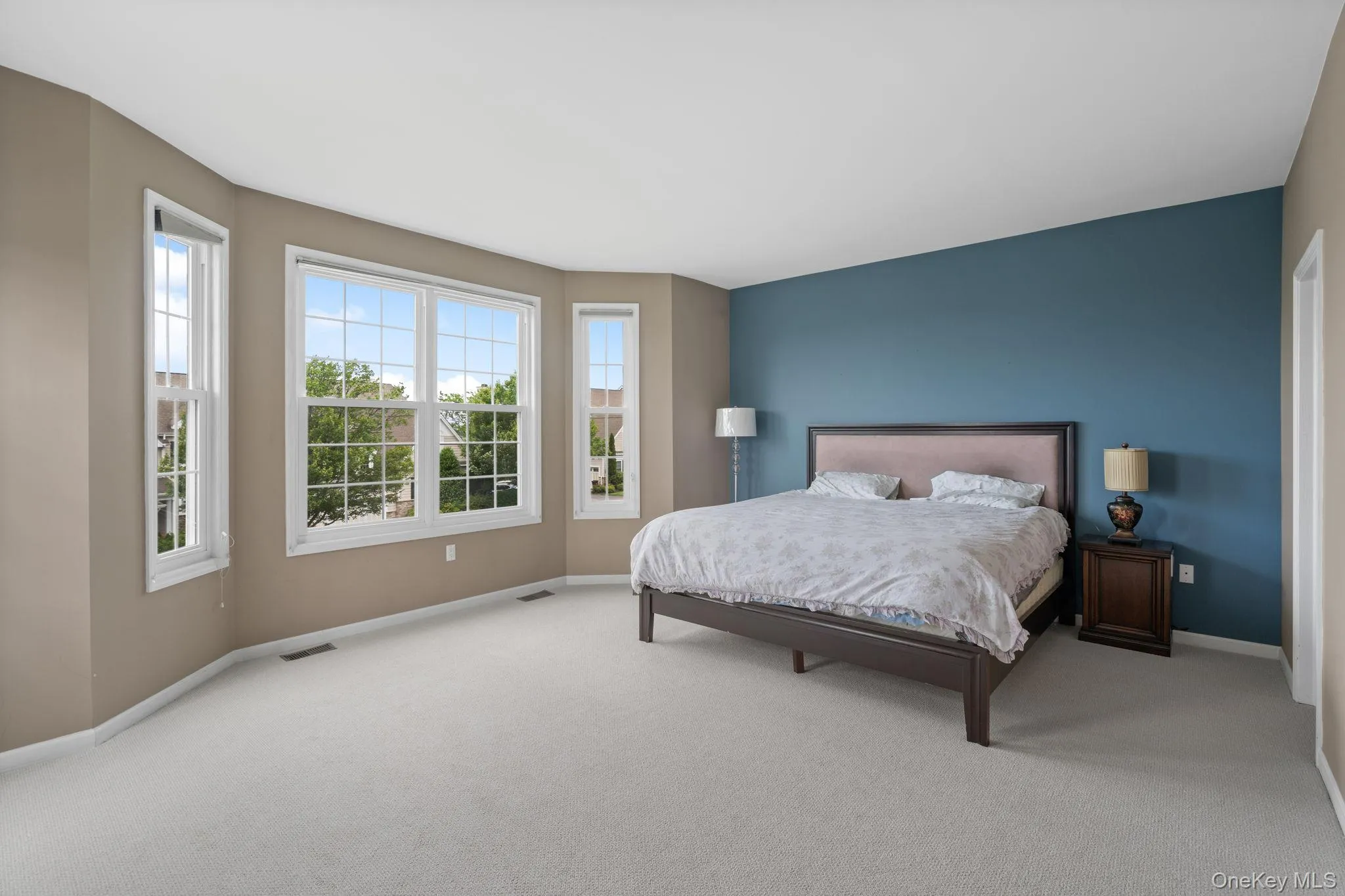 Bedroom featuring carpet flooring Bedroom featuring carpet flooring