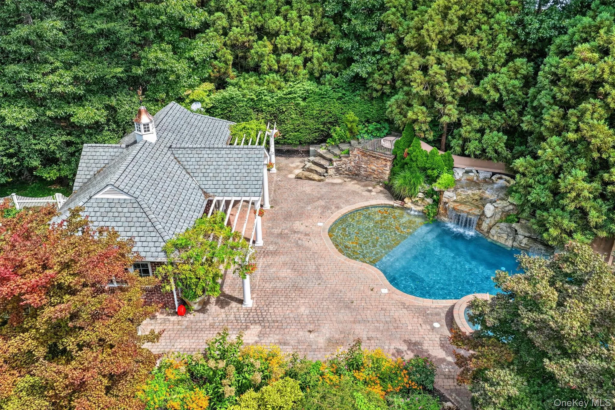 Aerial view of pool and pool house Aerial view of pool and pool house