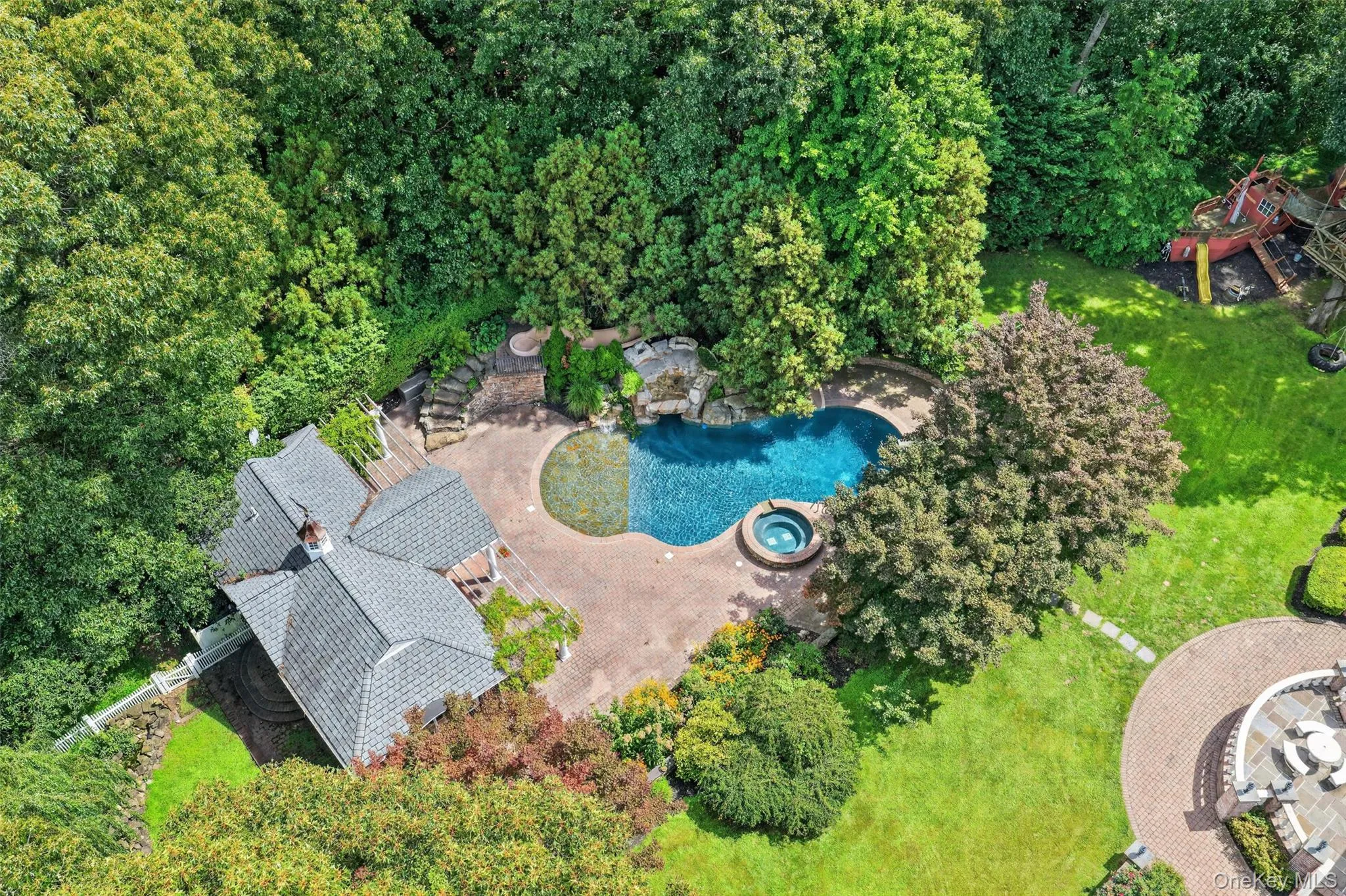 Aerial view of pool and pool house Aerial view of pool and pool house