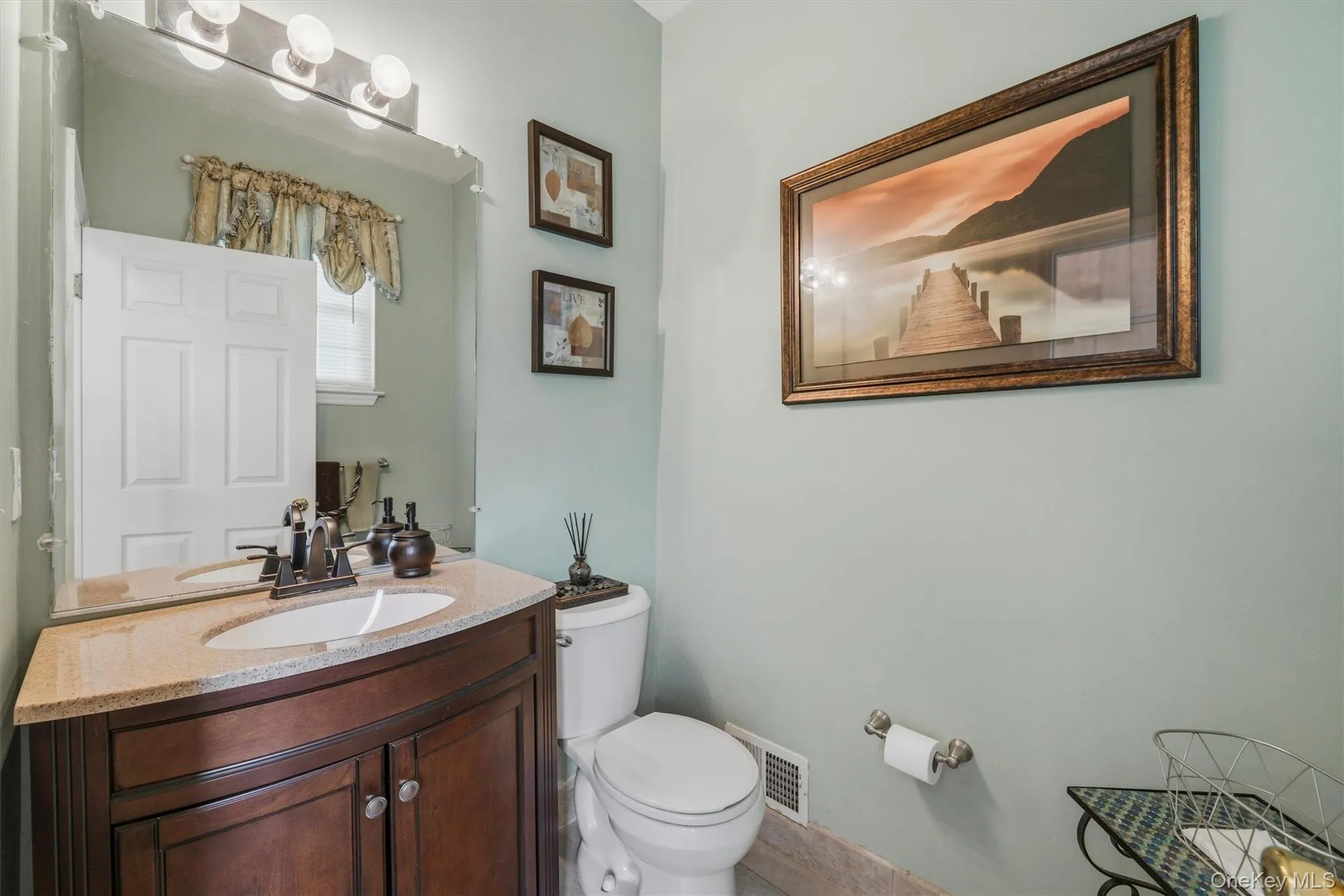 Powder room on the main level. Powder room on the main level.