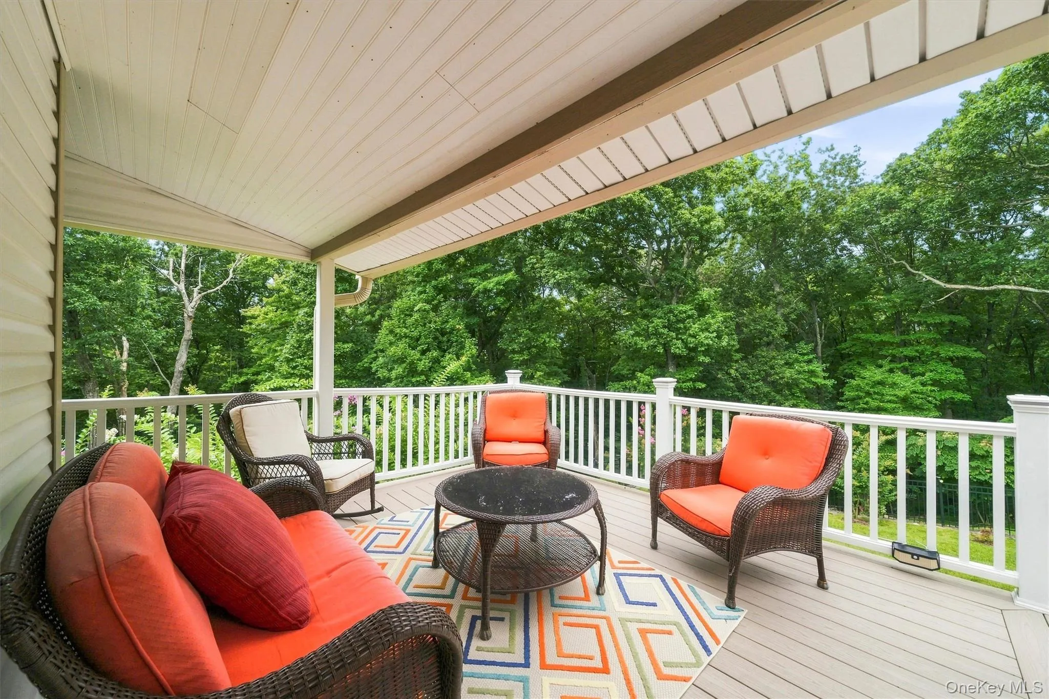 The large composite deck is the perfect spot for morning coffee or to unwind after a long day. The large composite deck is the perfect spot for morning coffee or to unwind after a long day.