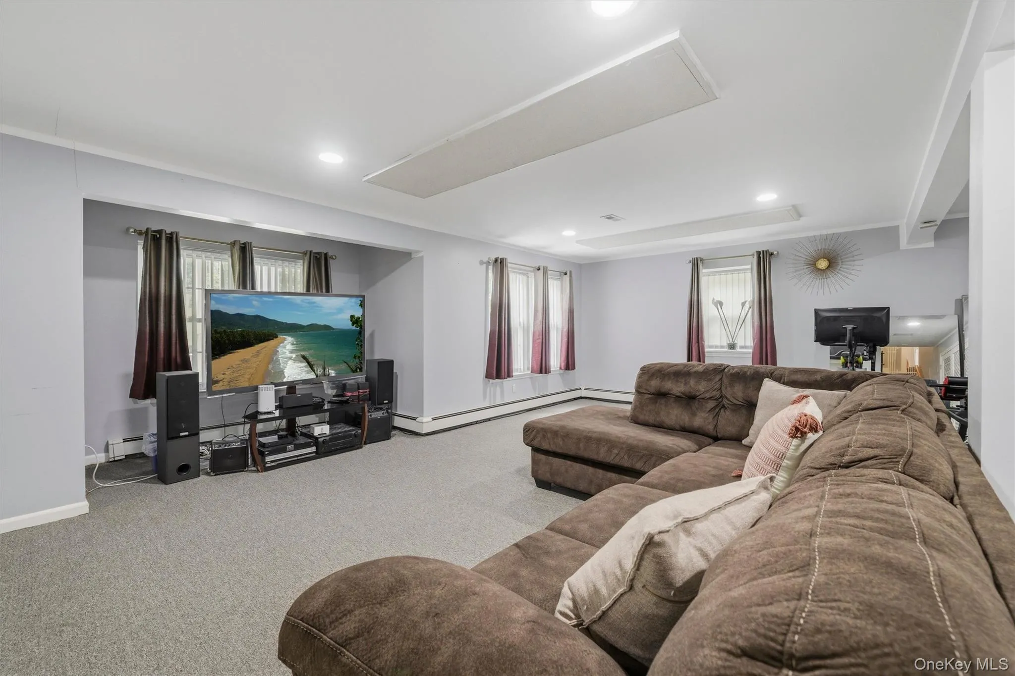 Lower level recreation room. Perfect for a TV room or game room. Great space for a home gym. Lower level recreation room. Perfect for a TV room or game room. Great space for a home gym.