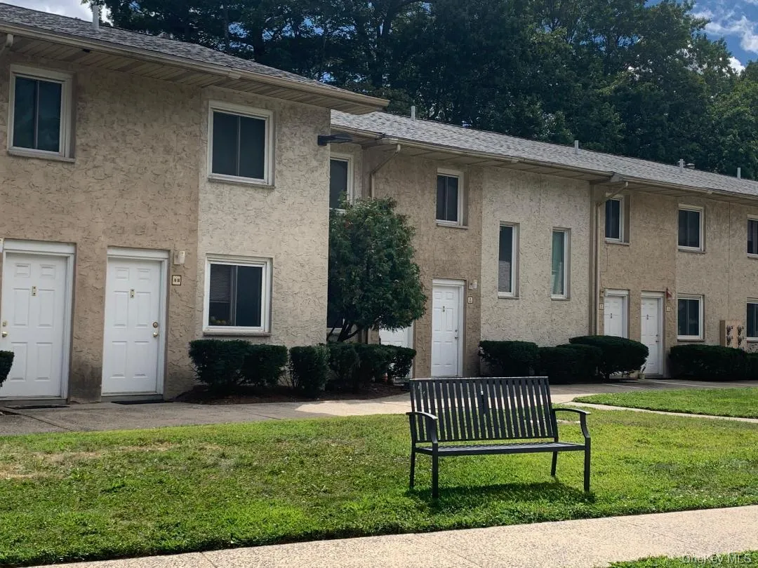 Inviting setting with private entrance only steps to the parking area Inviting setting with private entrance only steps to the parking area