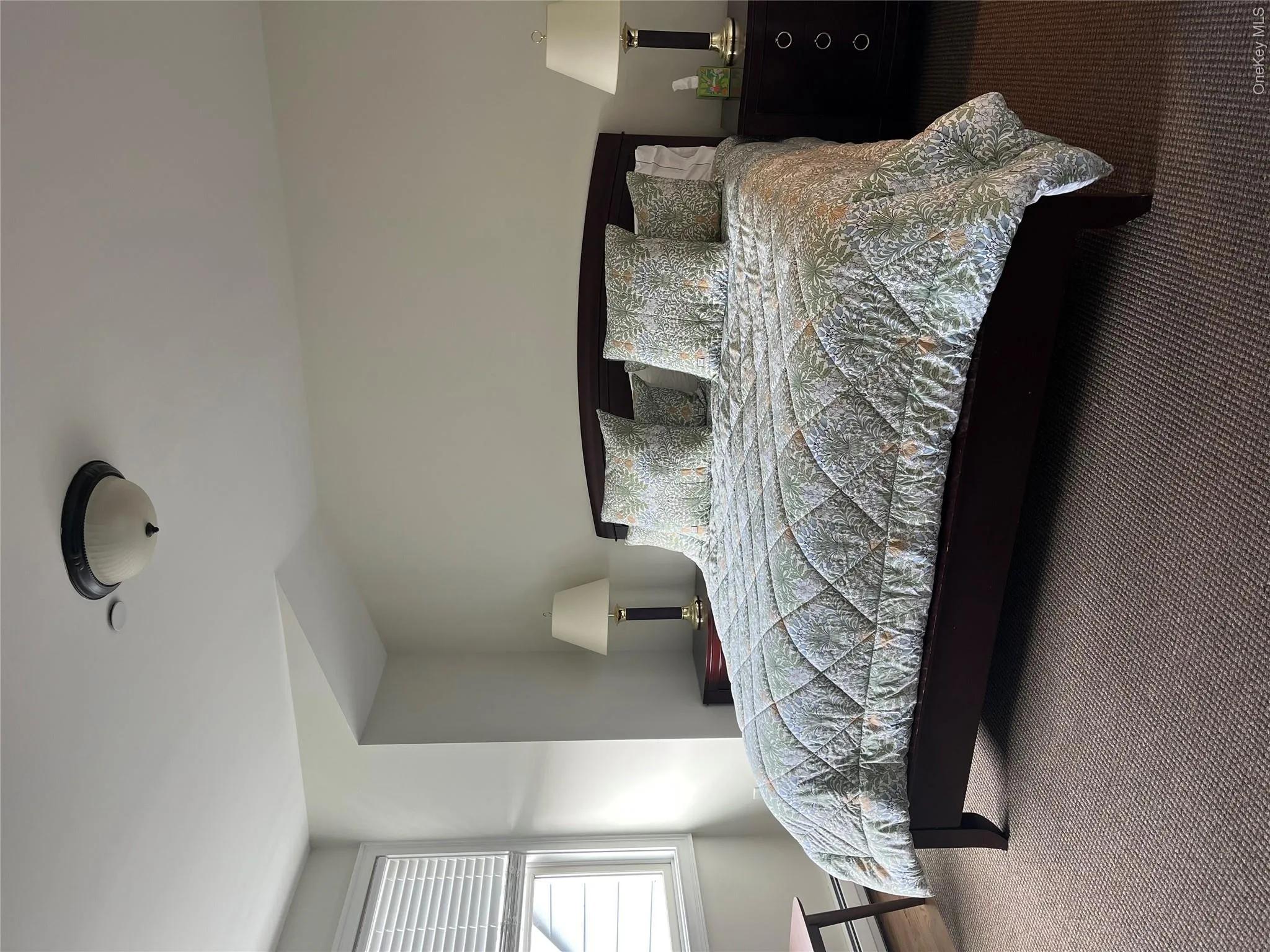 Bedroom with a baseboard radiator Bedroom with a baseboard radiator