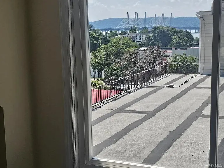 Your entry foyer includes a closet armoire along with gorgeous views of the Hudson River and the Mario Cuomo Bridge. Your entry foyer includes a closet armoire along with gorgeous views of the Hudson River and the Mario Cuomo Bridge.