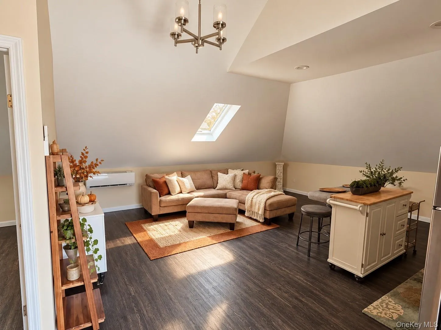 Spacious living room with stunning skylight enveloping the room with natural light. Spacious living room with stunning skylight enveloping the room with natural light.
