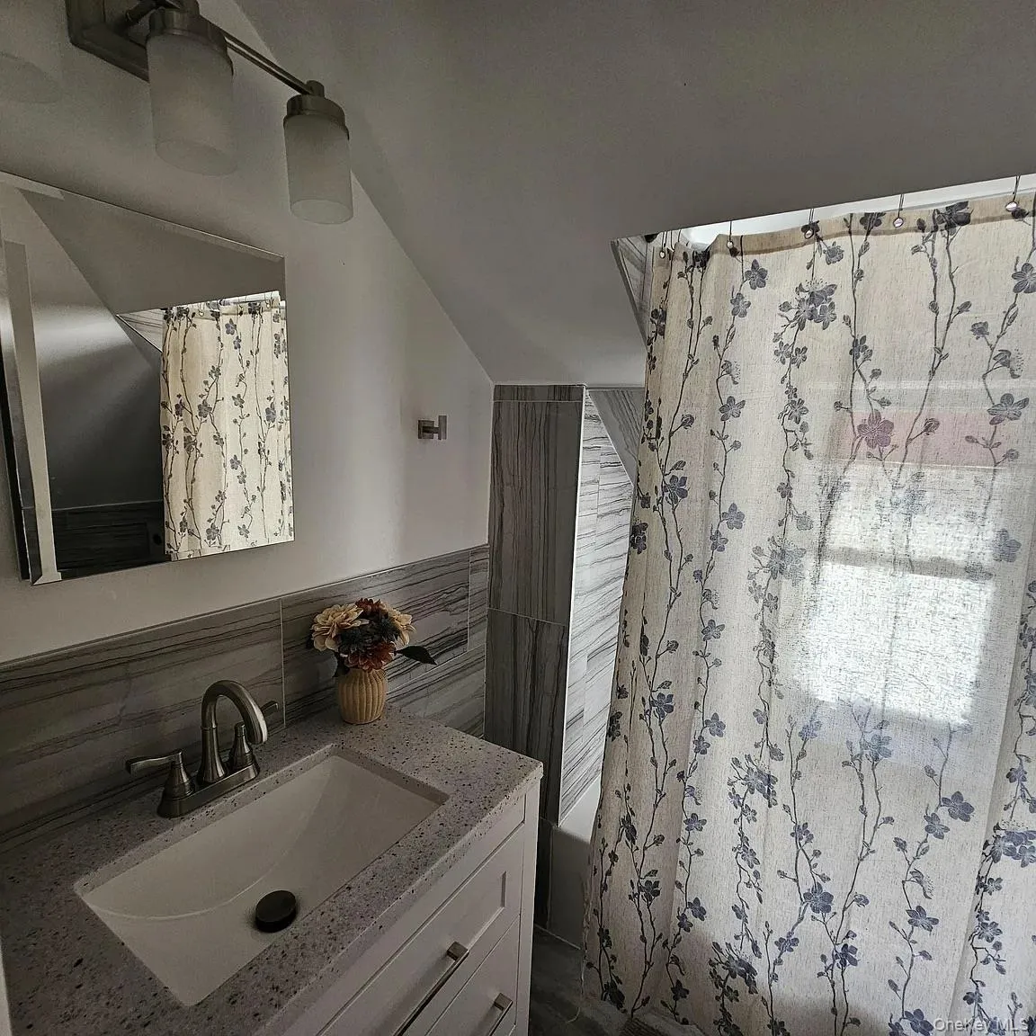 Spacious bathroom with tub, shower and plenty of storage. Spacious bathroom with tub, shower and plenty of storage.