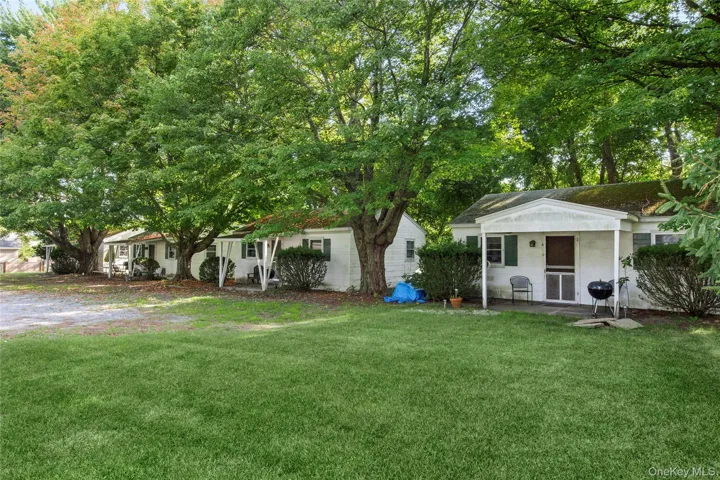 Eastern side view of Cottages 1-4 on 1.16acre